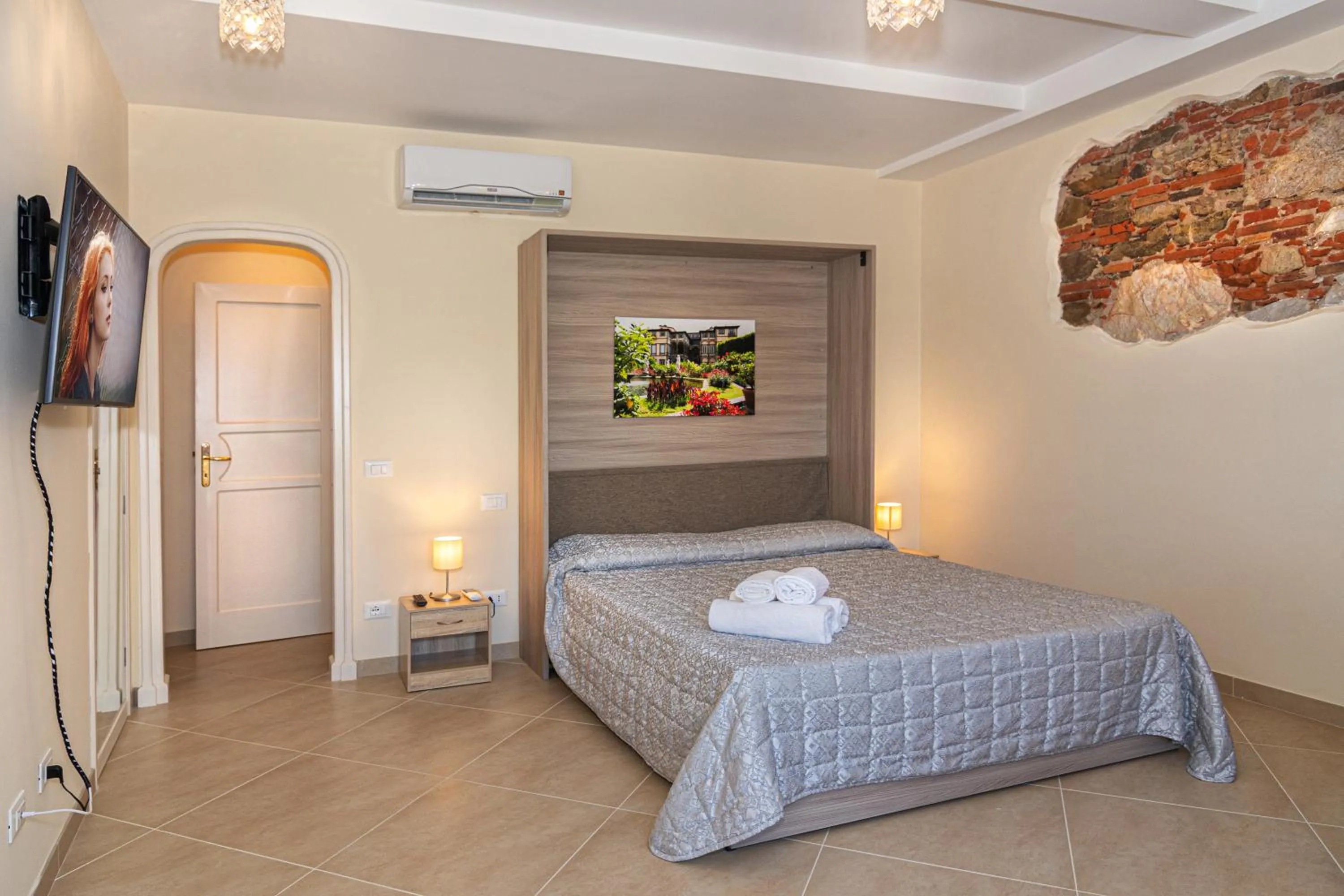 Bed in B&B Il Giardino dei Poeti and Apartaments