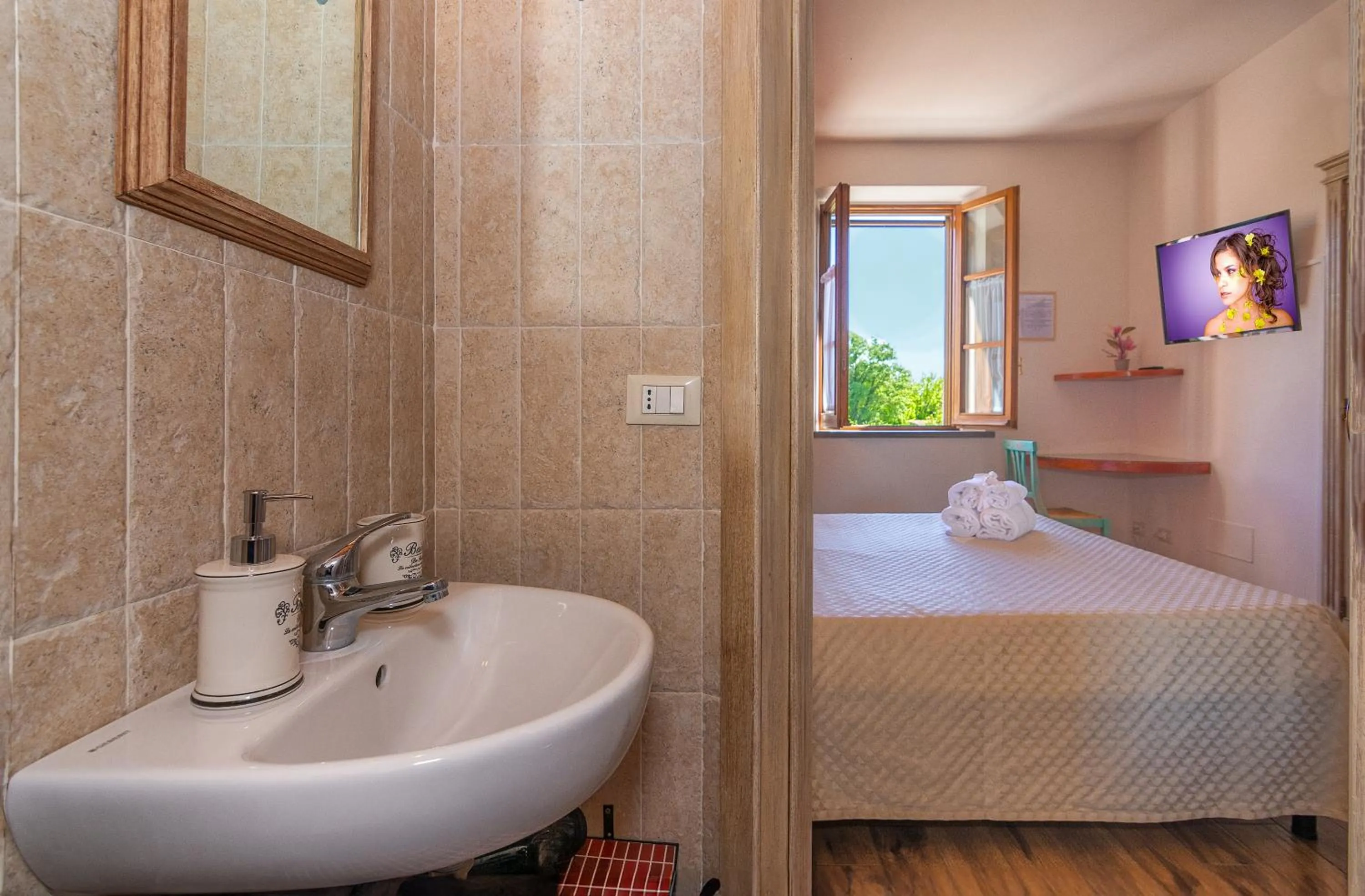 Bed in B&B Il Giardino dei Poeti and Apartaments