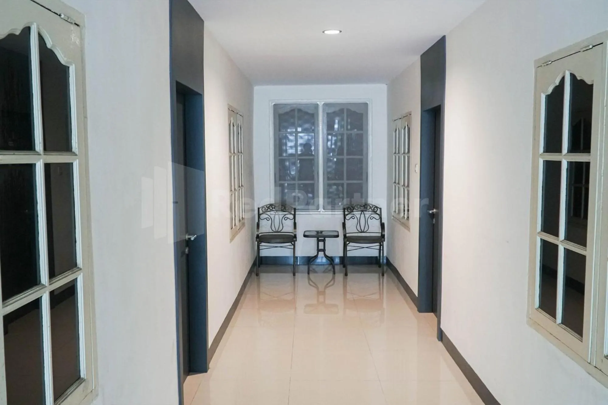 Seating area in New Gentala Hotel Medan RedPartner