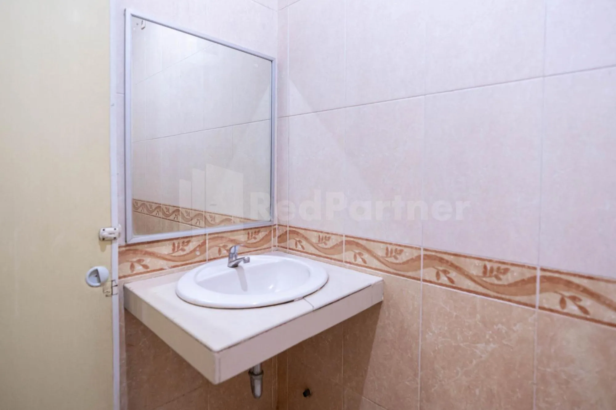 Bathroom in New Gentala Hotel Medan RedPartner