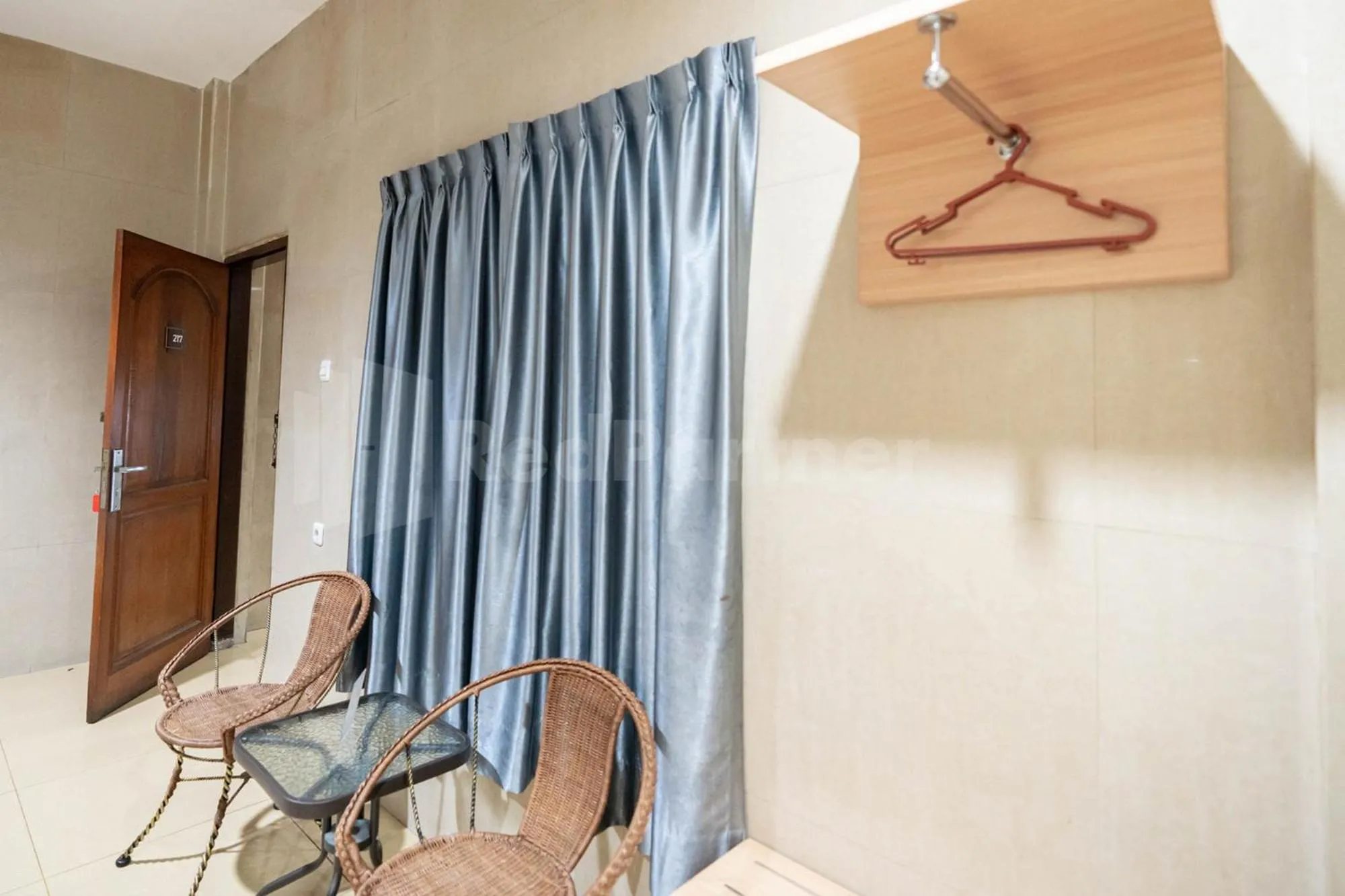 Seating area in New Gentala Hotel Medan RedPartner