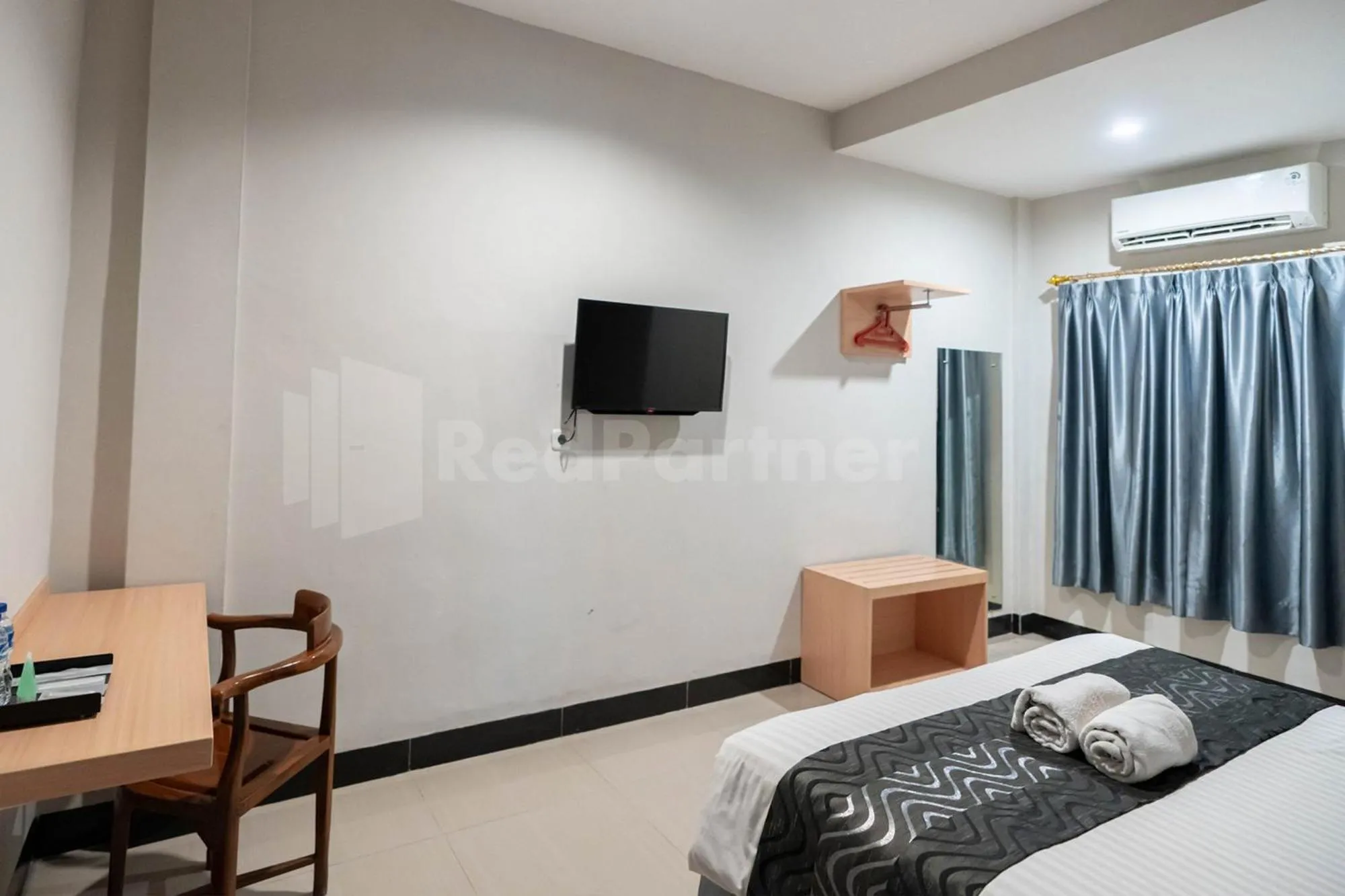 Bed in New Gentala Hotel Medan RedPartner