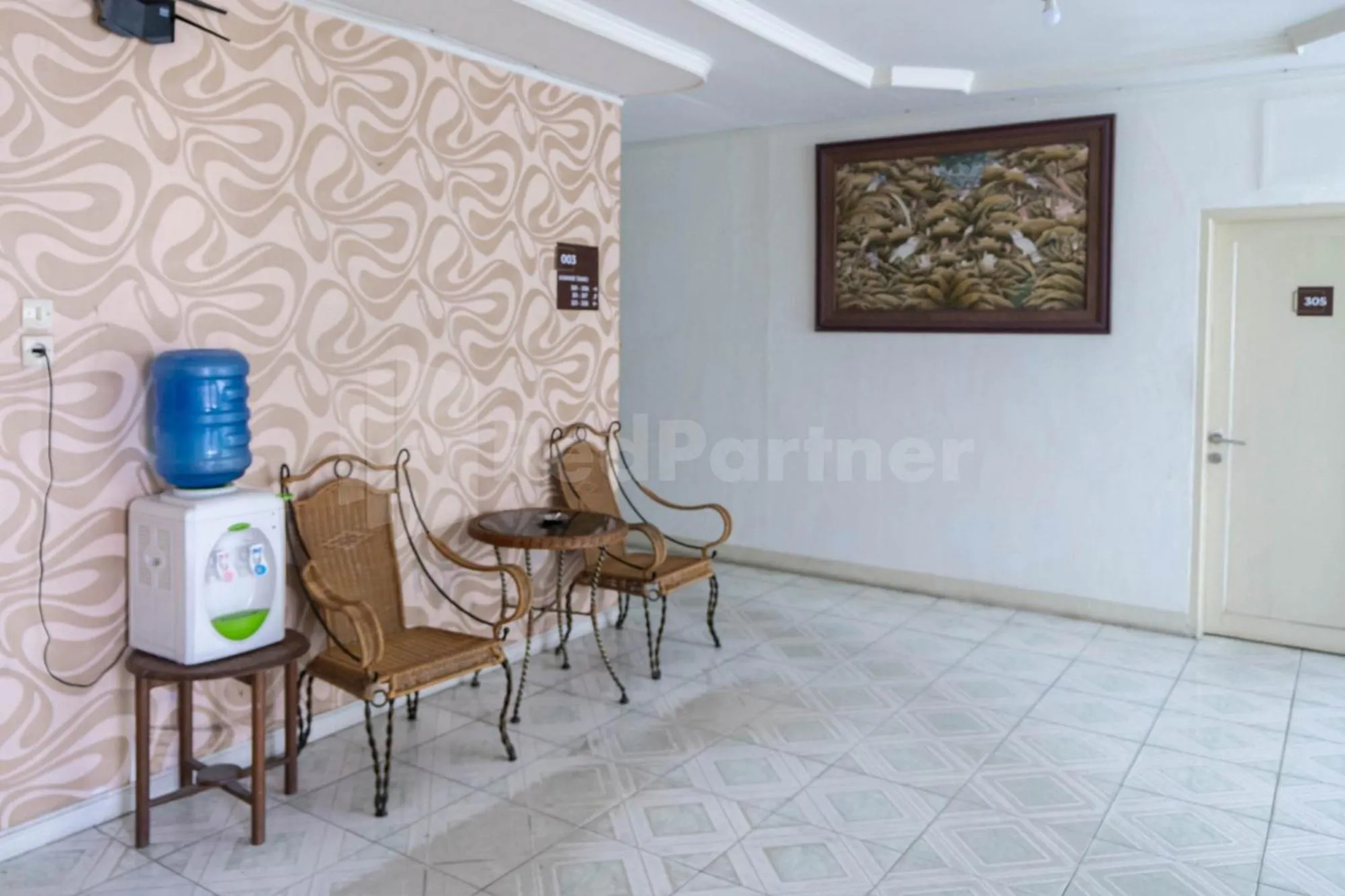 Seating area in New Gentala Hotel Medan RedPartner