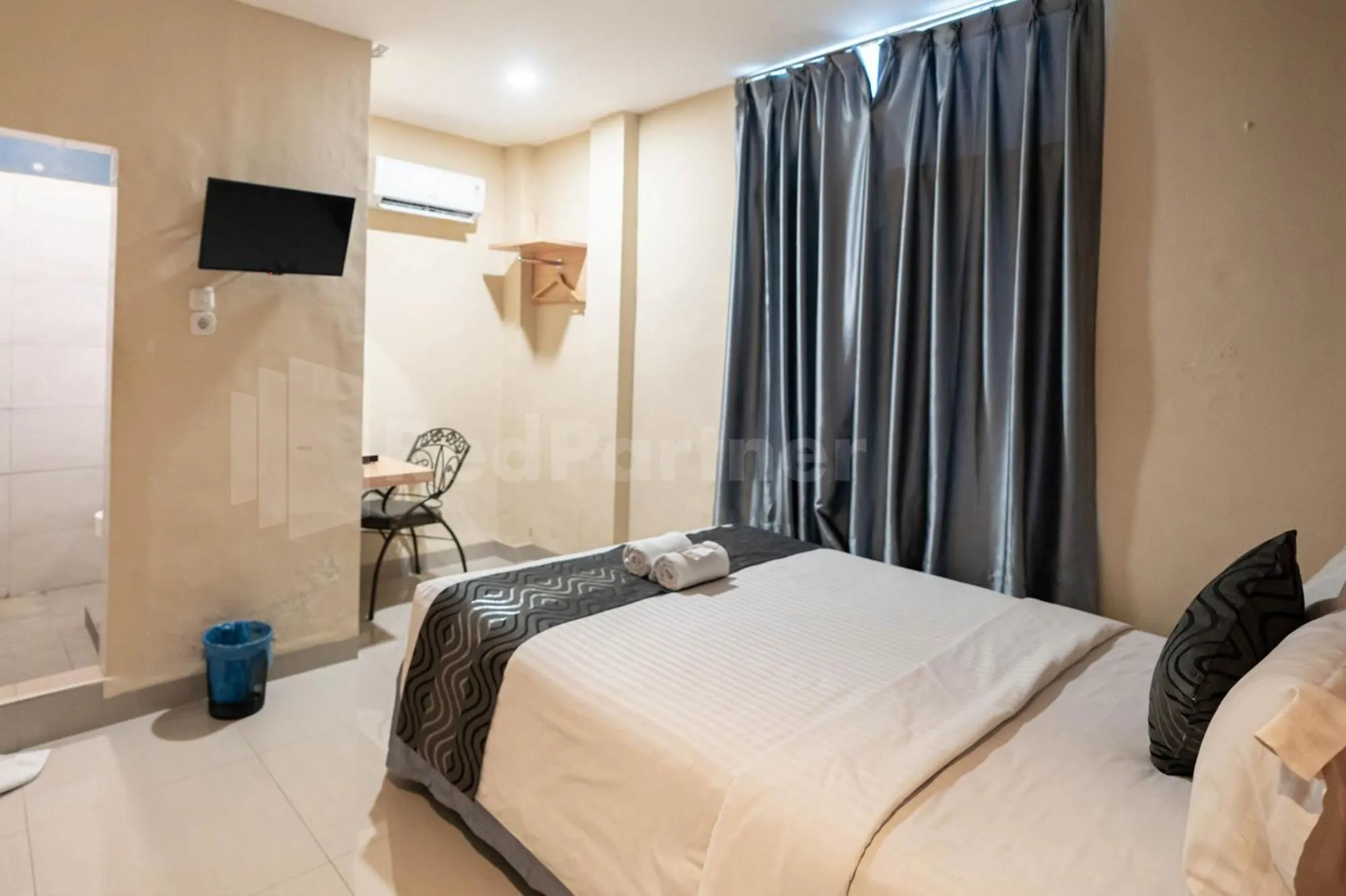 Bed in New Gentala Hotel Medan RedPartner