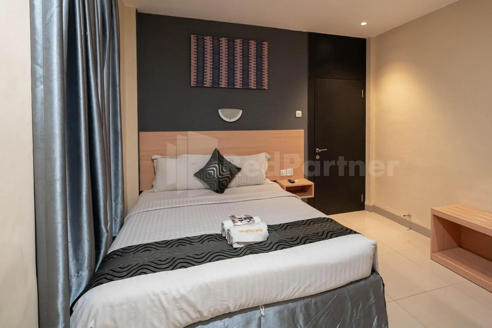 Bed in New Gentala Hotel Medan RedPartner