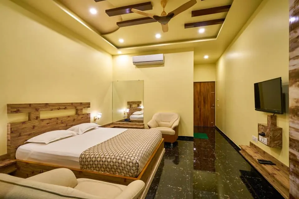 Bed in hotel saptarang residency panhala