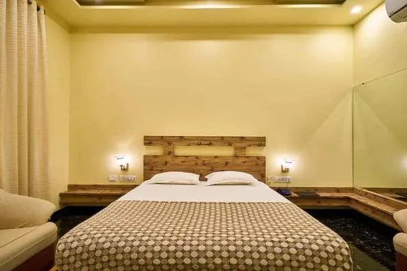 Bed in hotel saptarang residency panhala