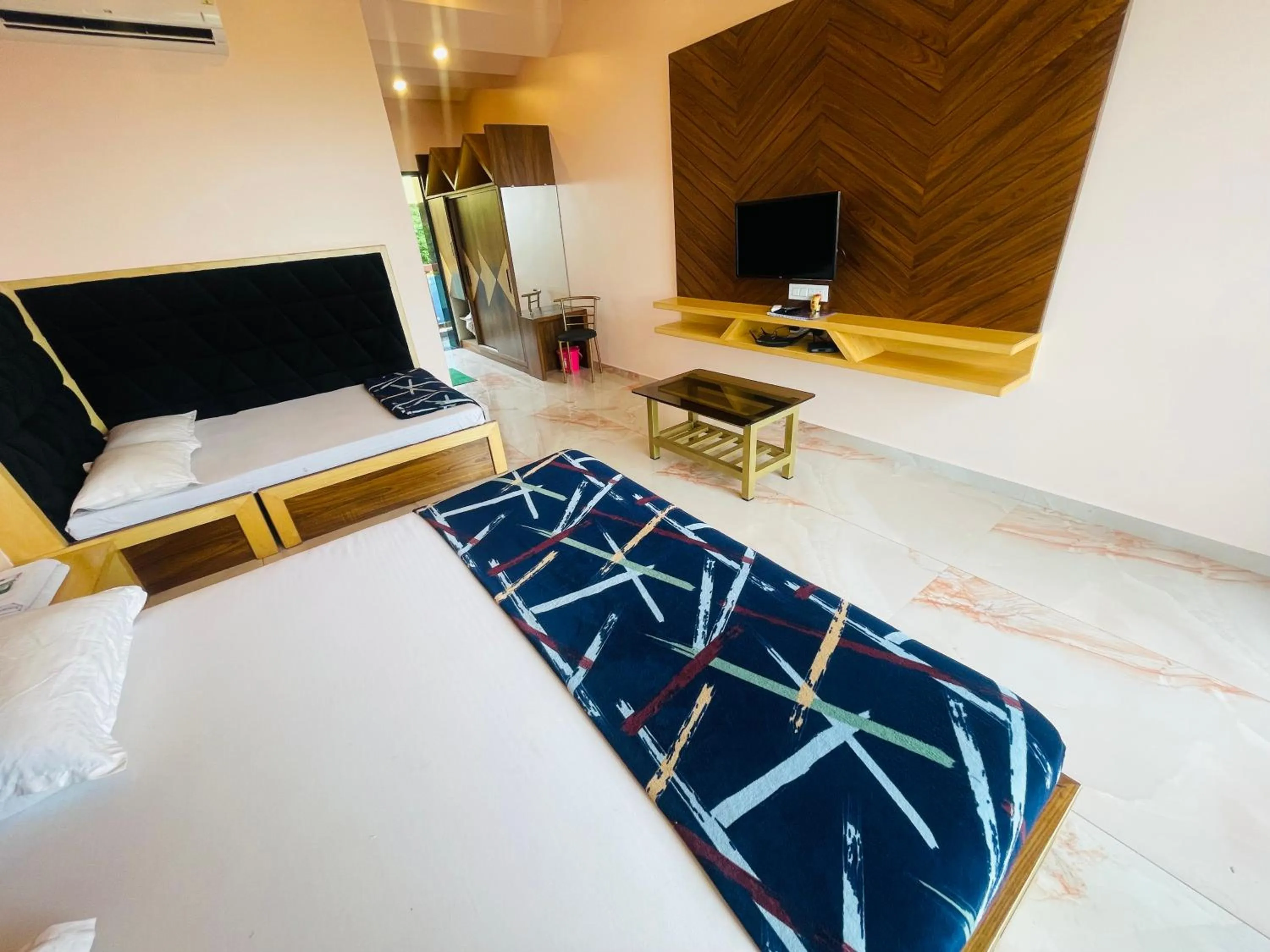 Bed in hotel saptarang residency panhala