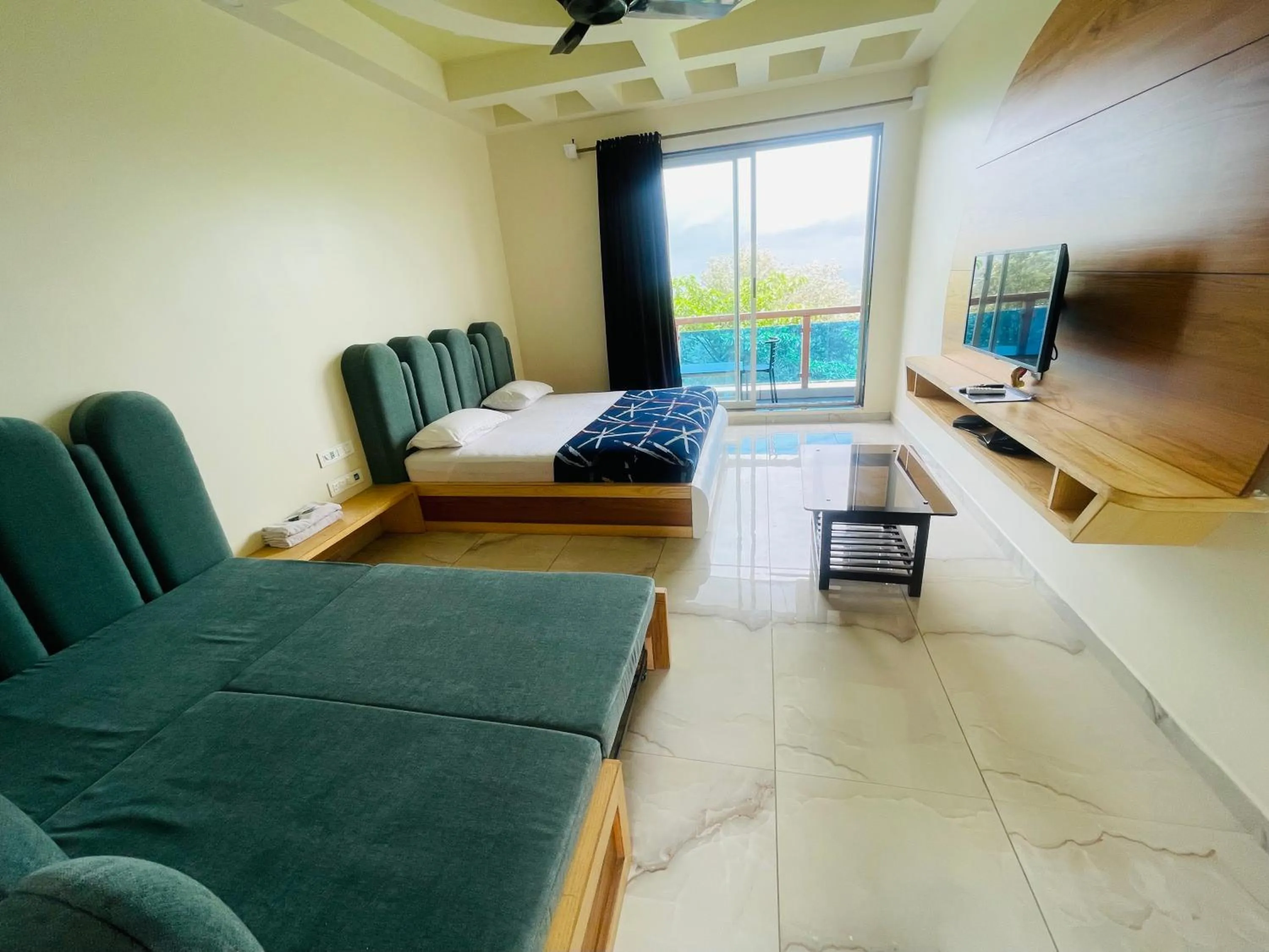 Bed in hotel saptarang residency panhala