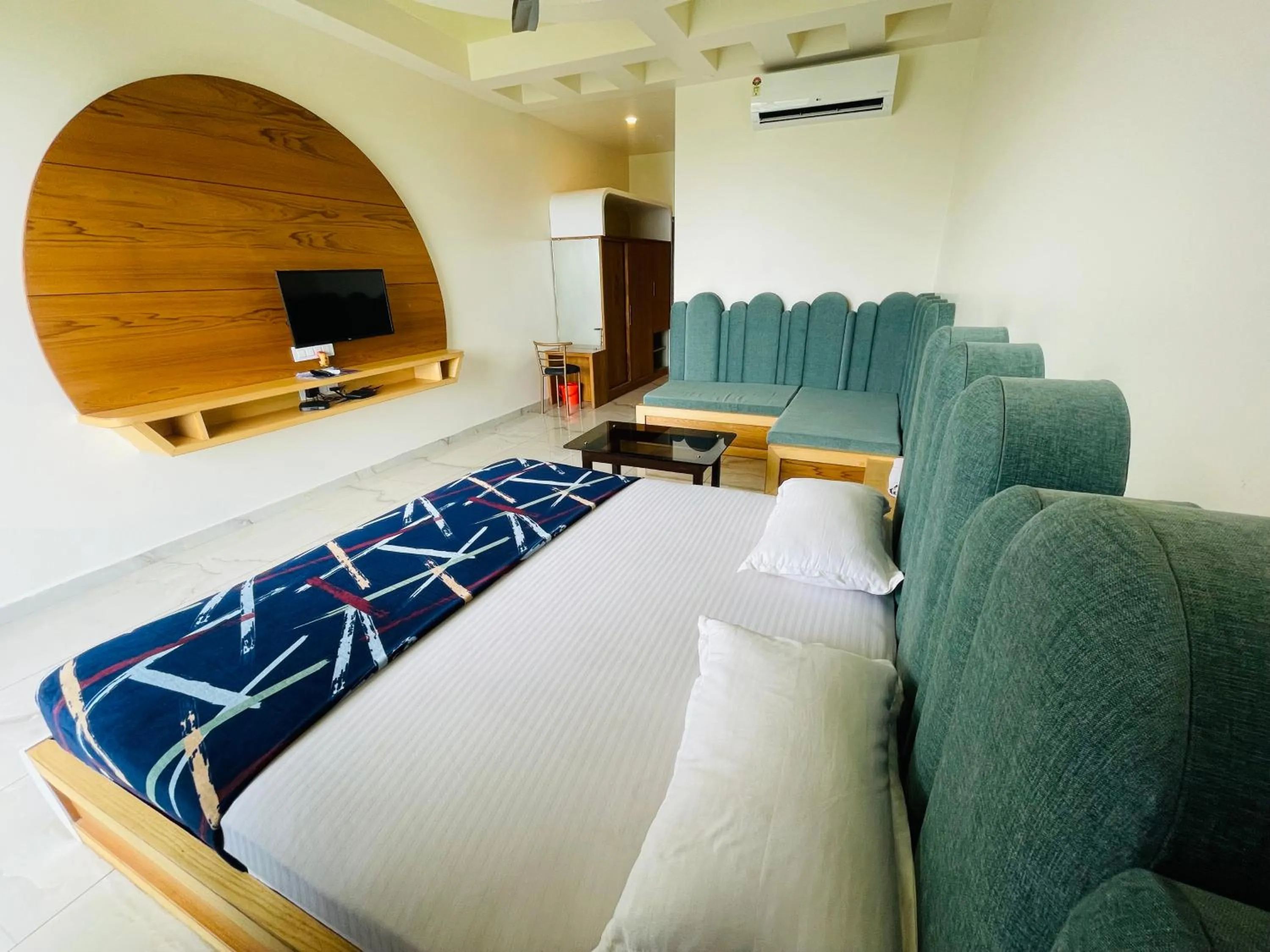 Bed in hotel saptarang residency panhala