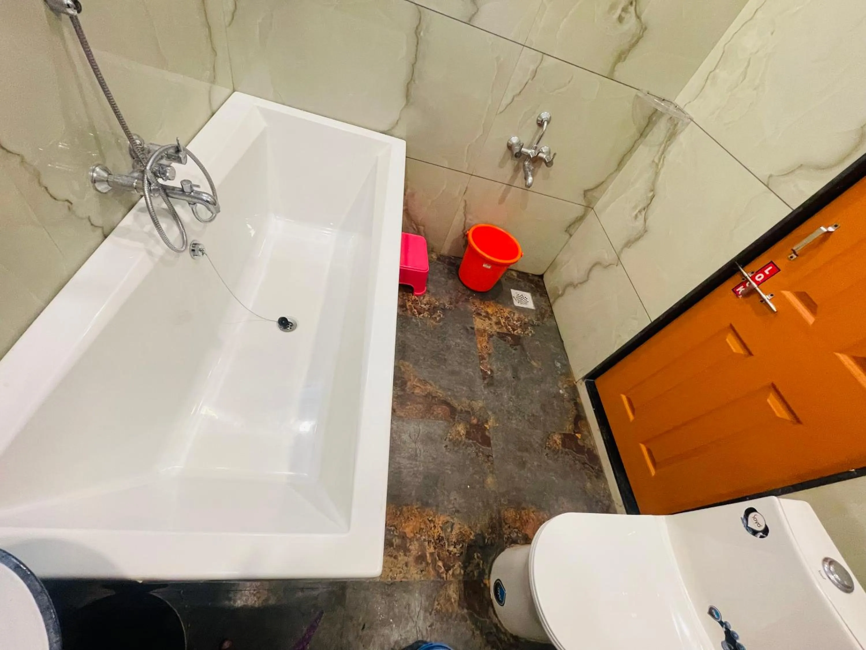 Shower in hotel saptarang residency panhala