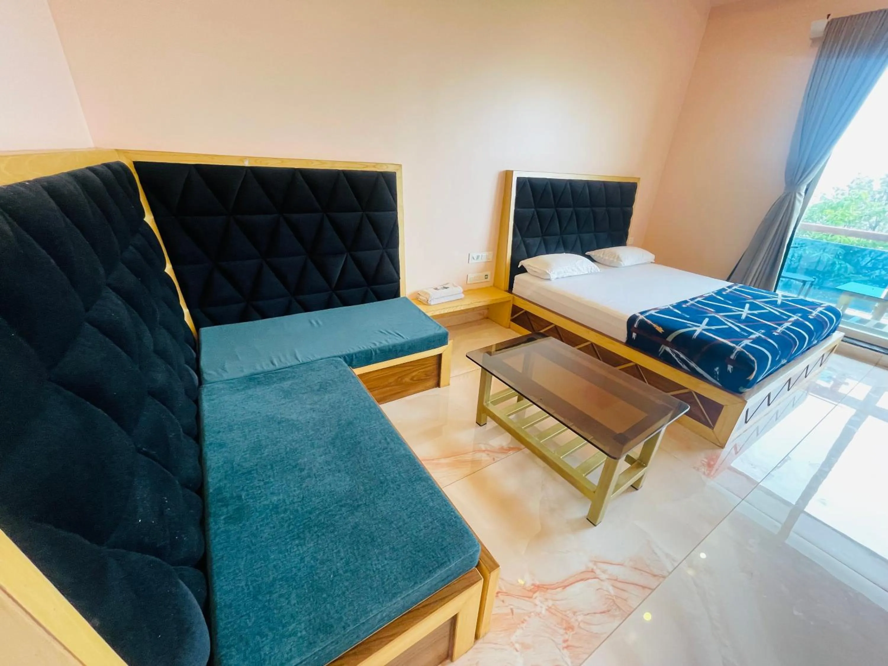 Bed in hotel saptarang residency panhala