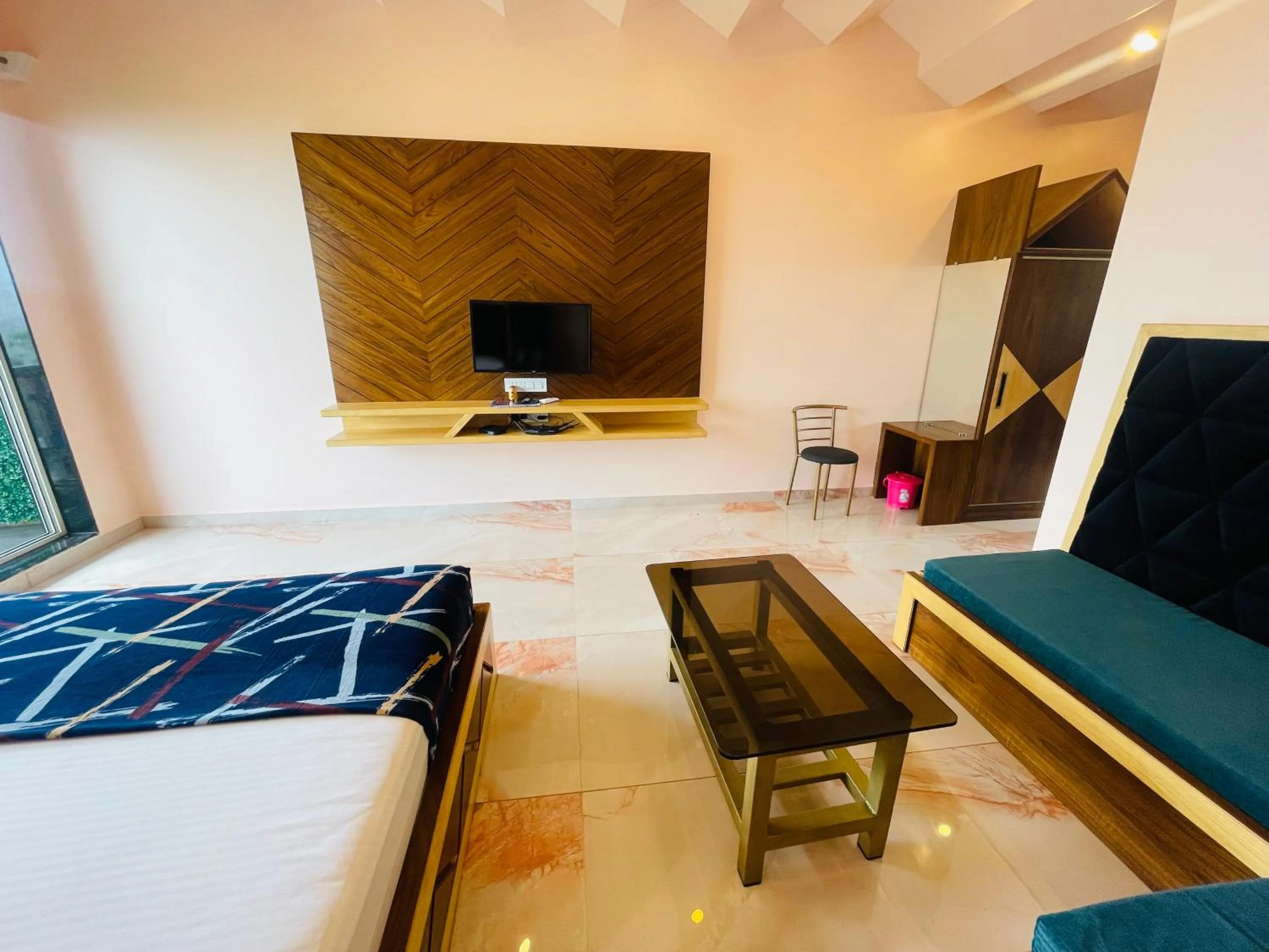 Bed in hotel saptarang residency panhala