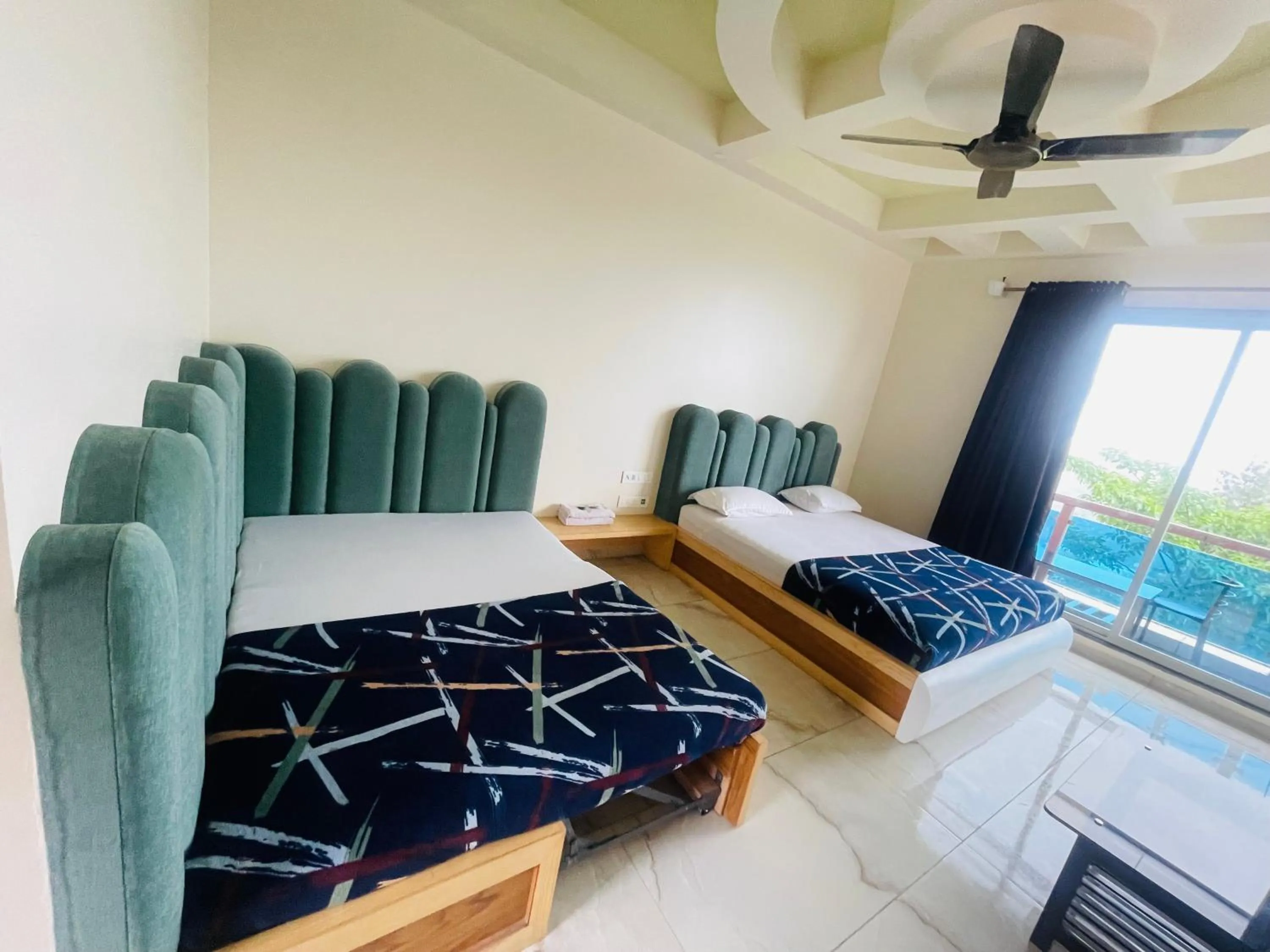 Bed in hotel saptarang residency panhala