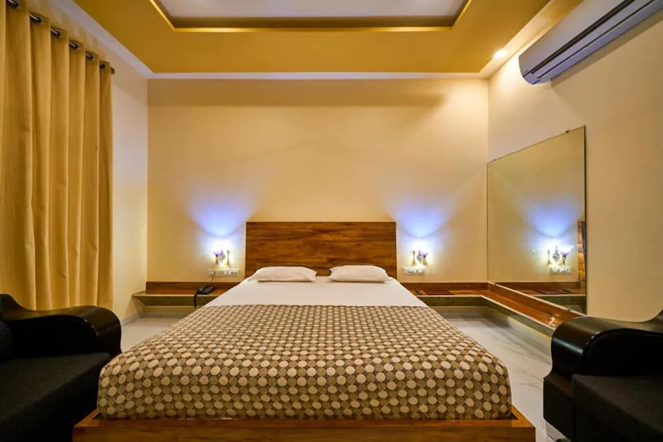 Bed in hotel saptarang residency panhala