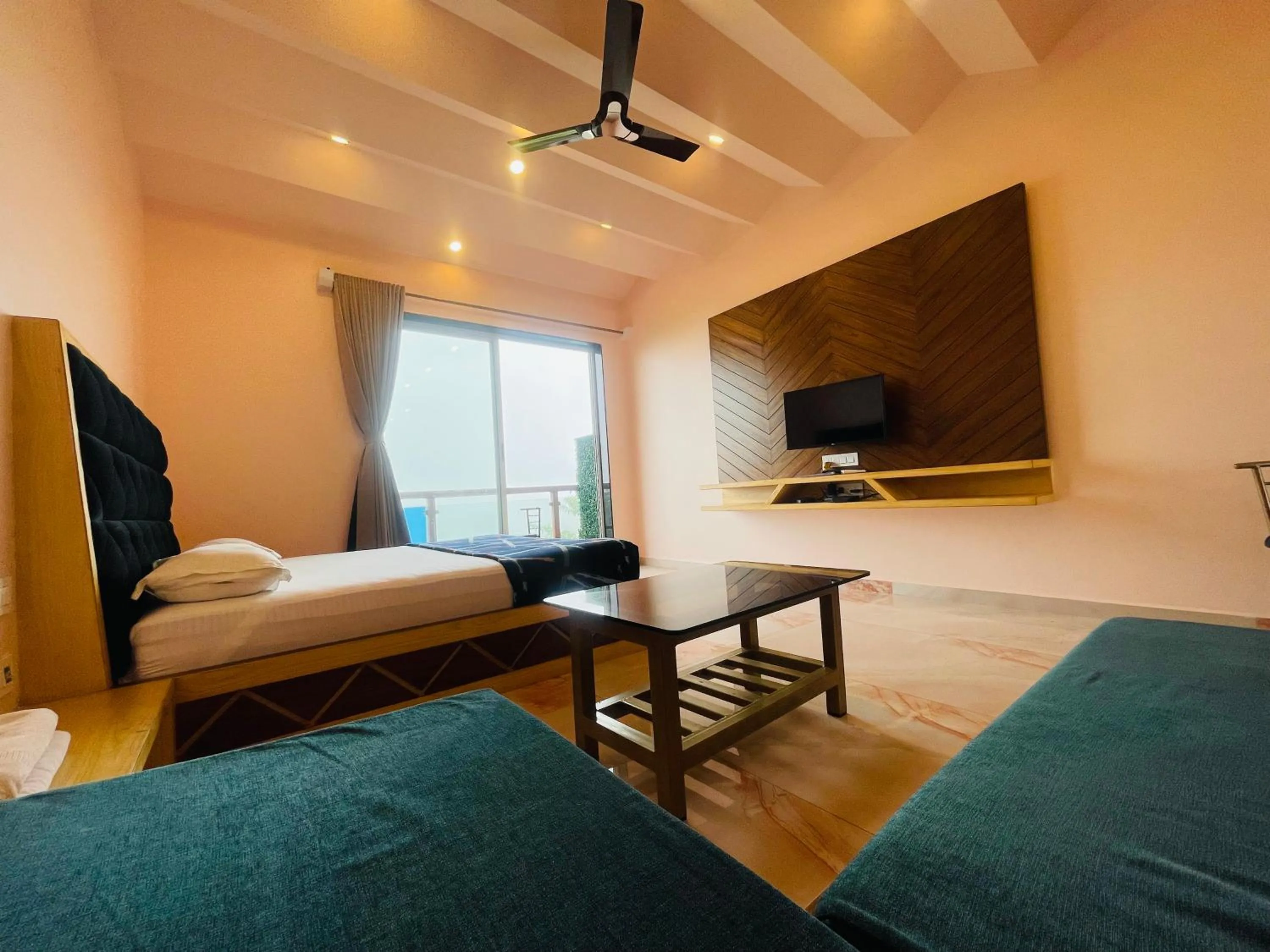 Bed in hotel saptarang residency panhala