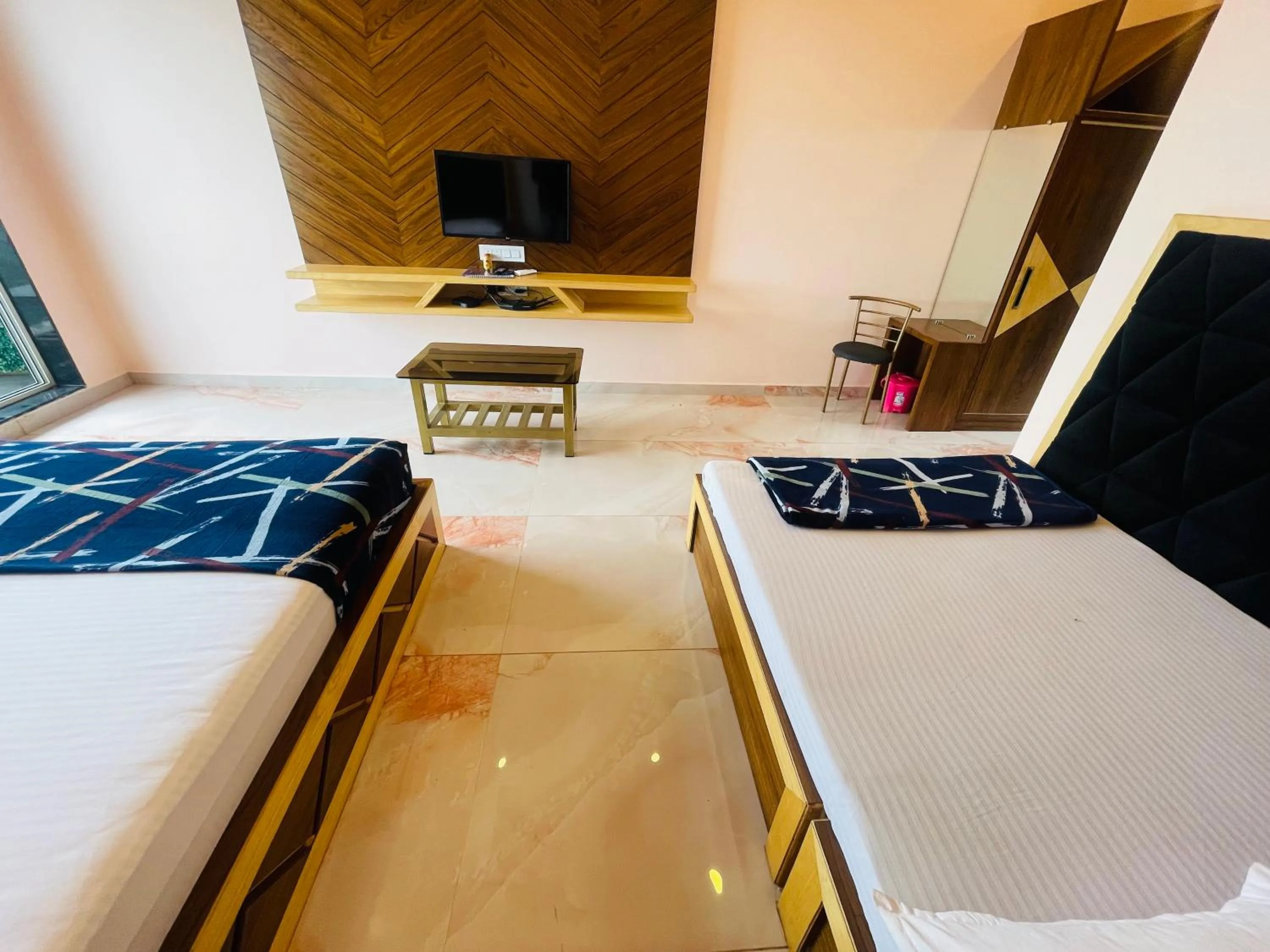 Bed in hotel saptarang residency panhala