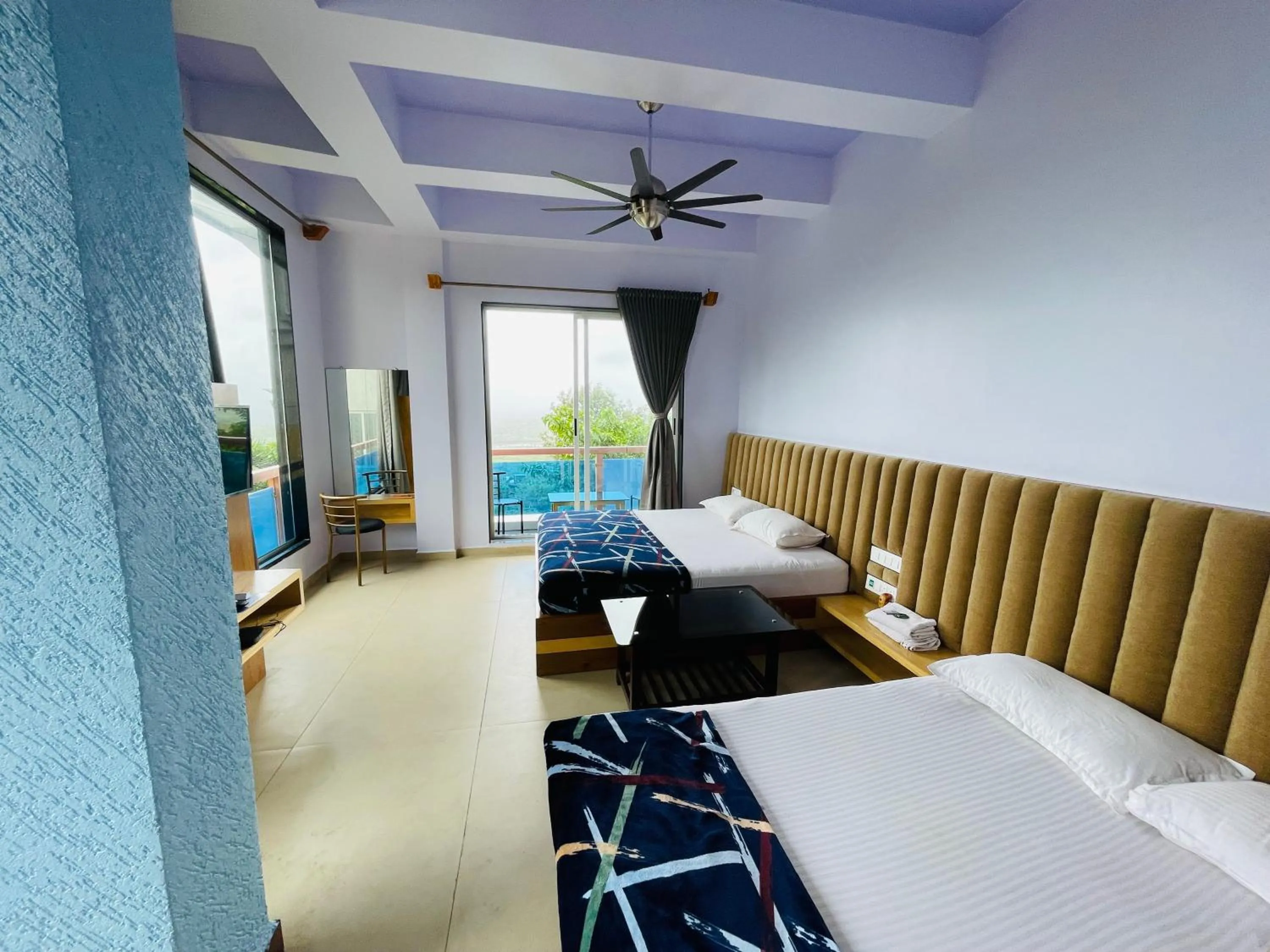 Bed in hotel saptarang residency panhala