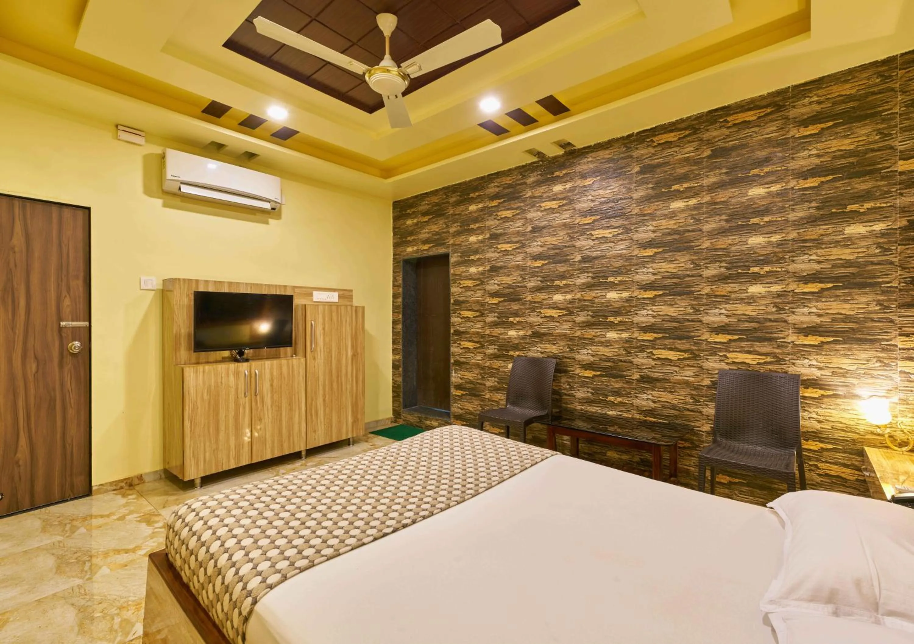 Bed in hotel saptarang residency panhala