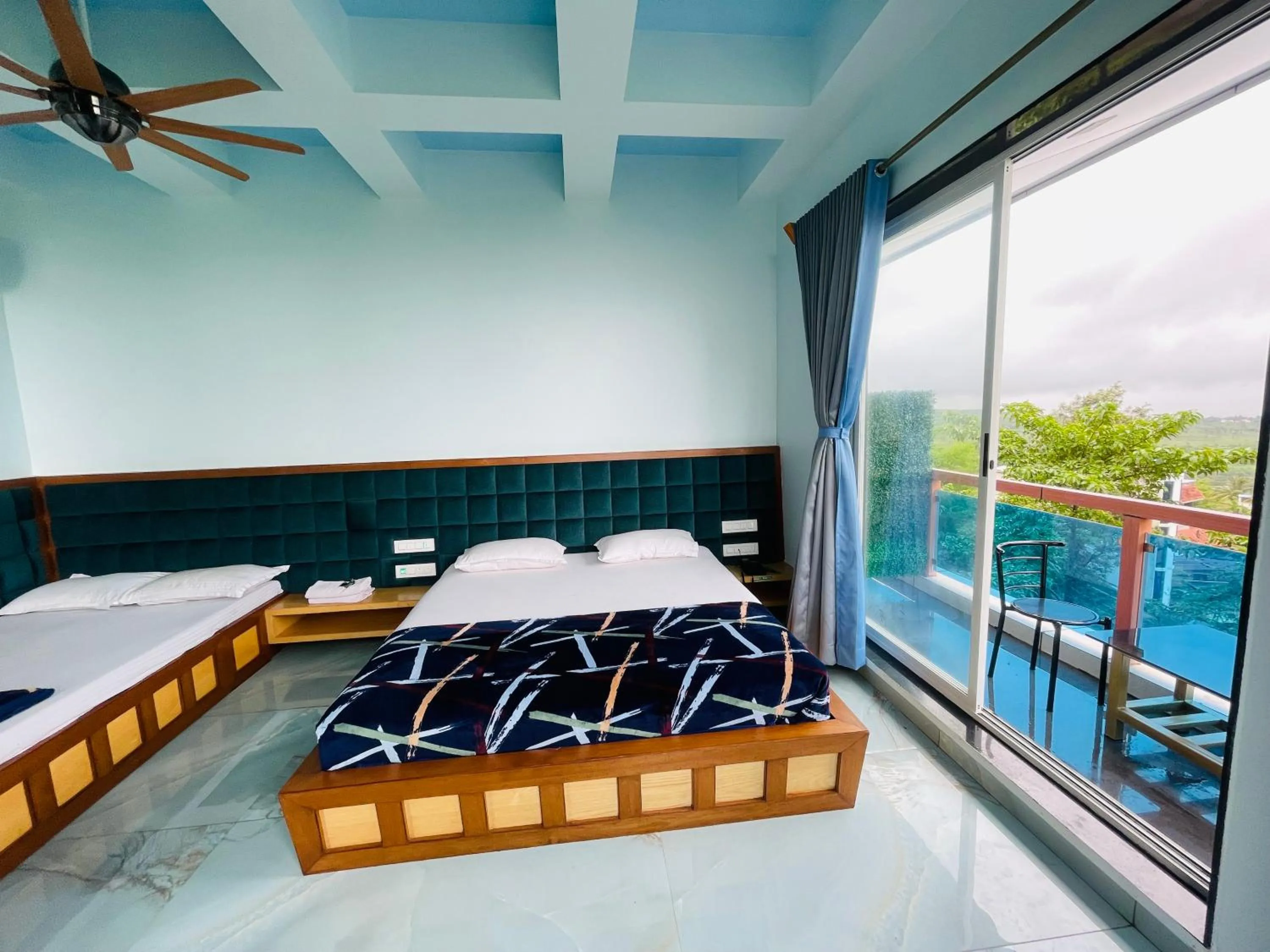 Bed in hotel saptarang residency panhala