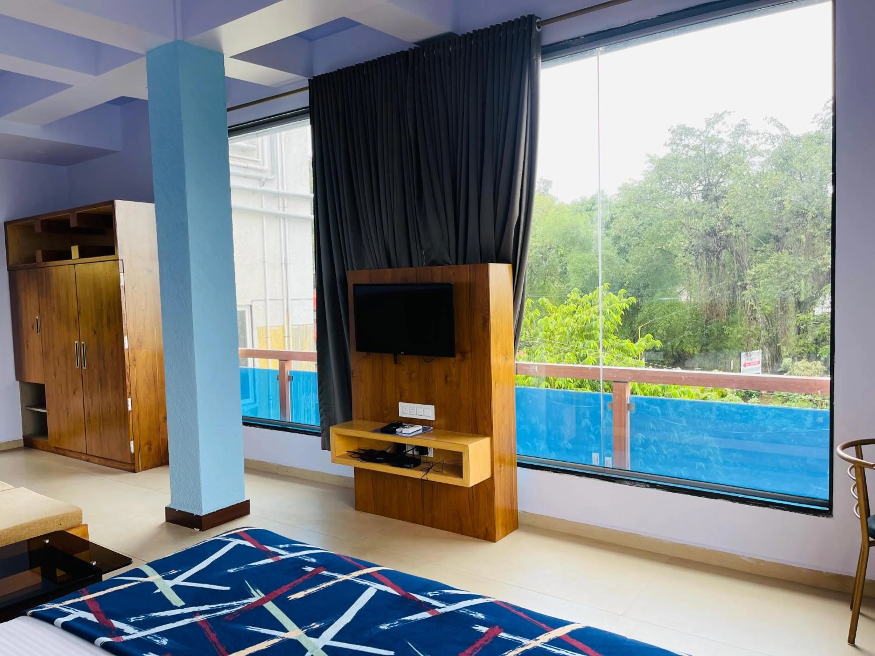 Bed in hotel saptarang residency panhala