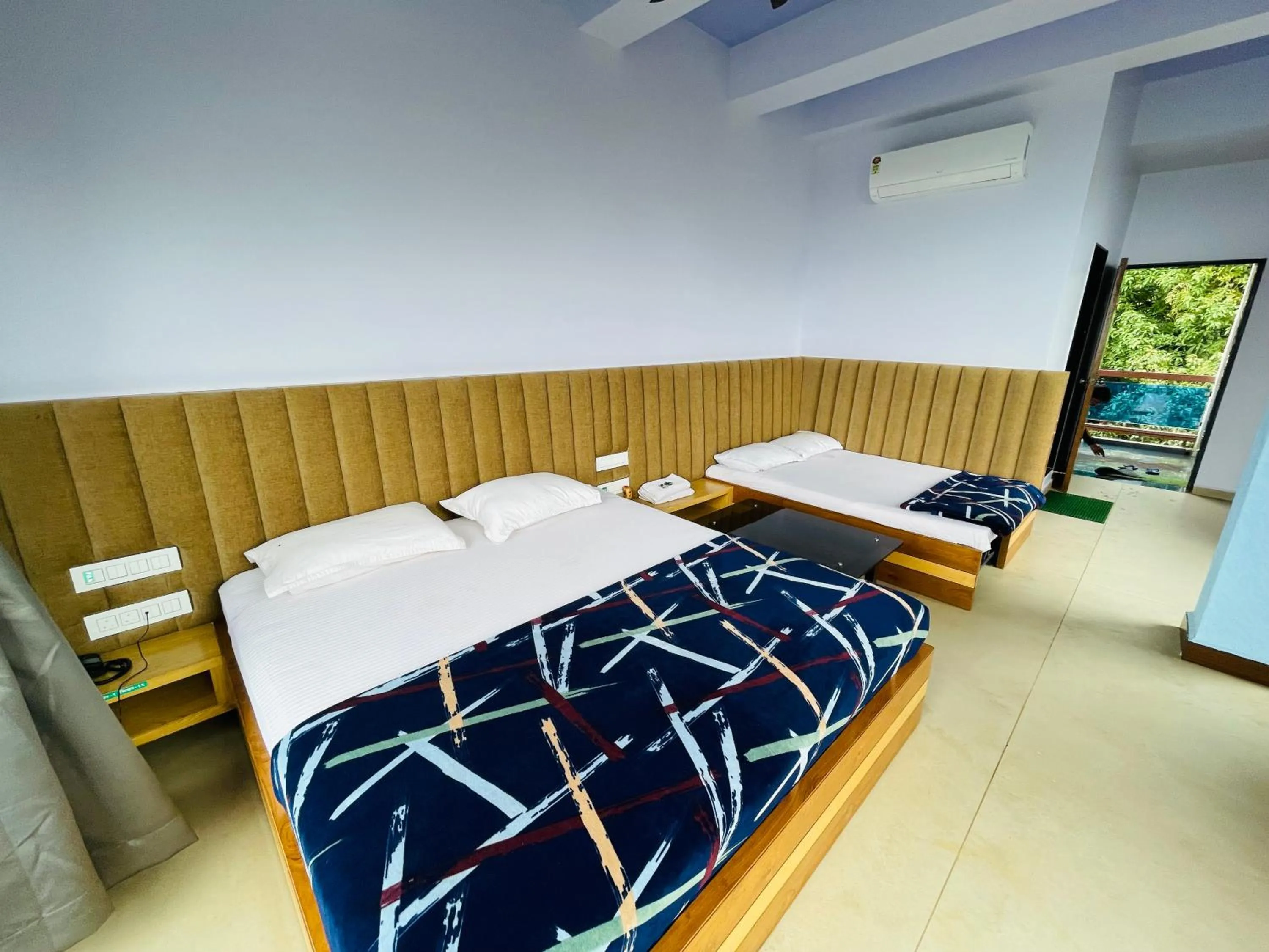 Bed in hotel saptarang residency panhala