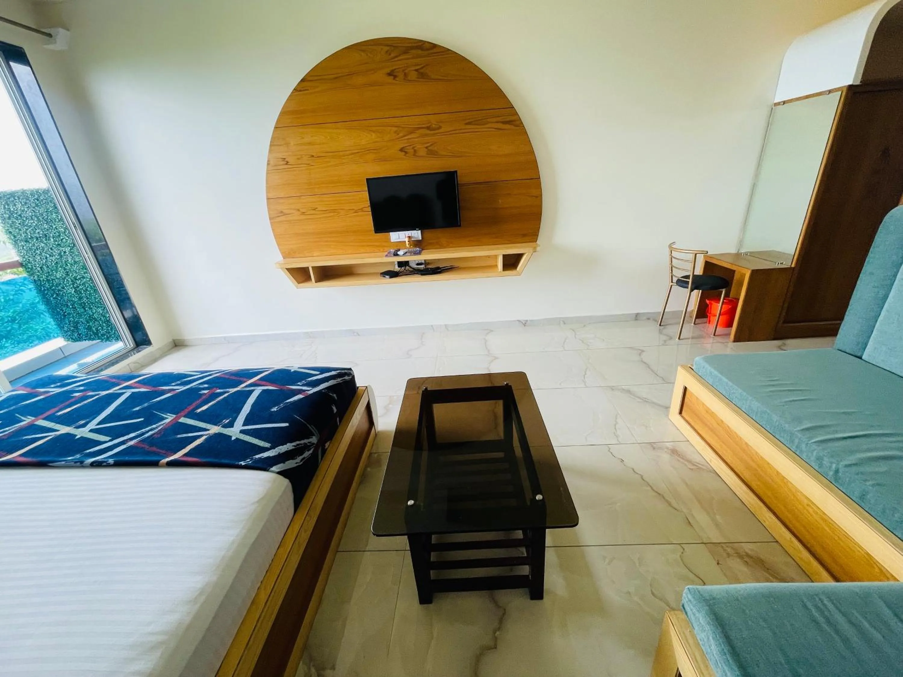 Bed in hotel saptarang residency panhala