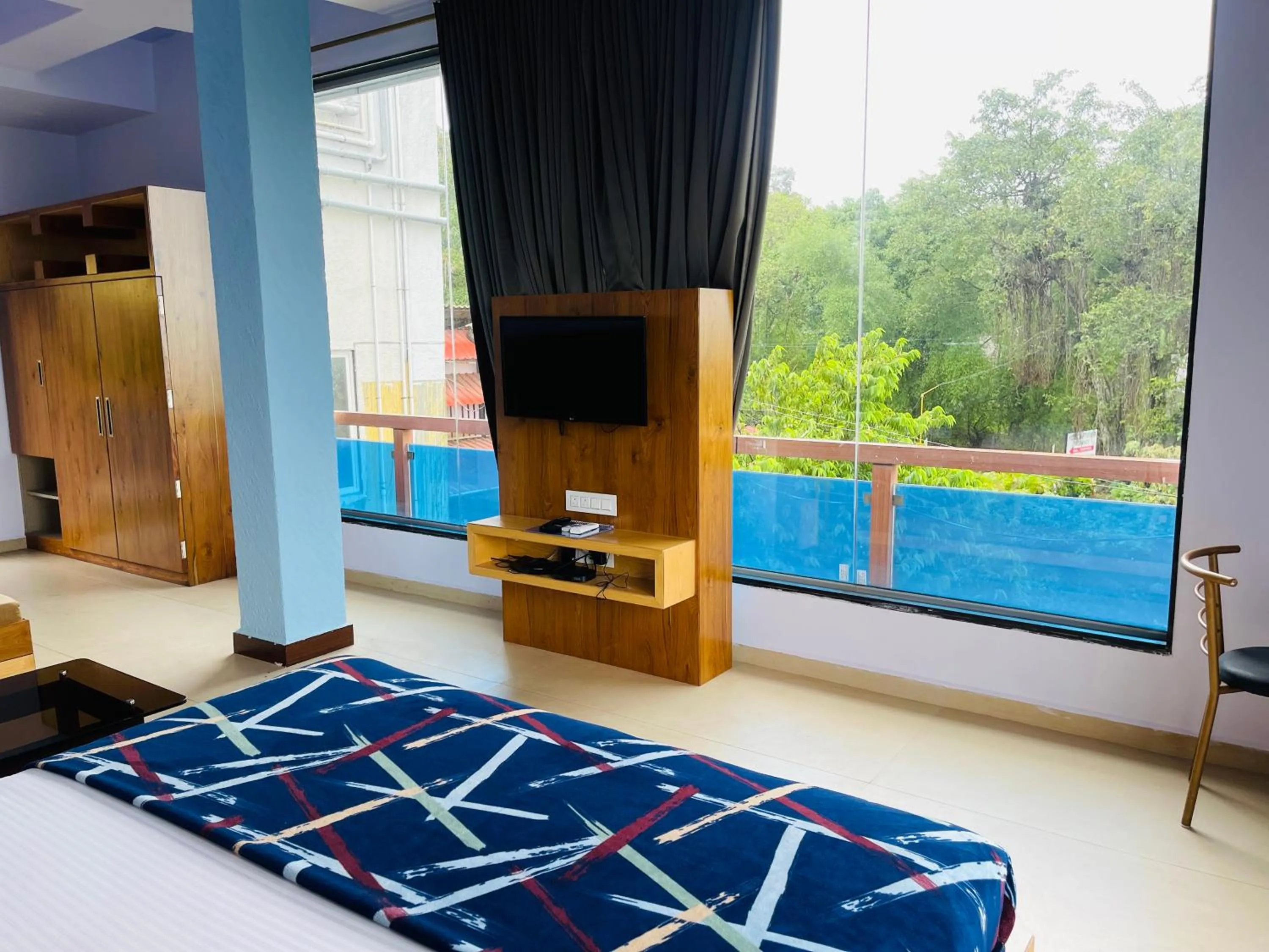 Bed in hotel saptarang residency panhala