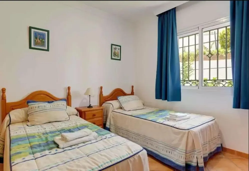 Bedroom, Bed in Villa Pastora