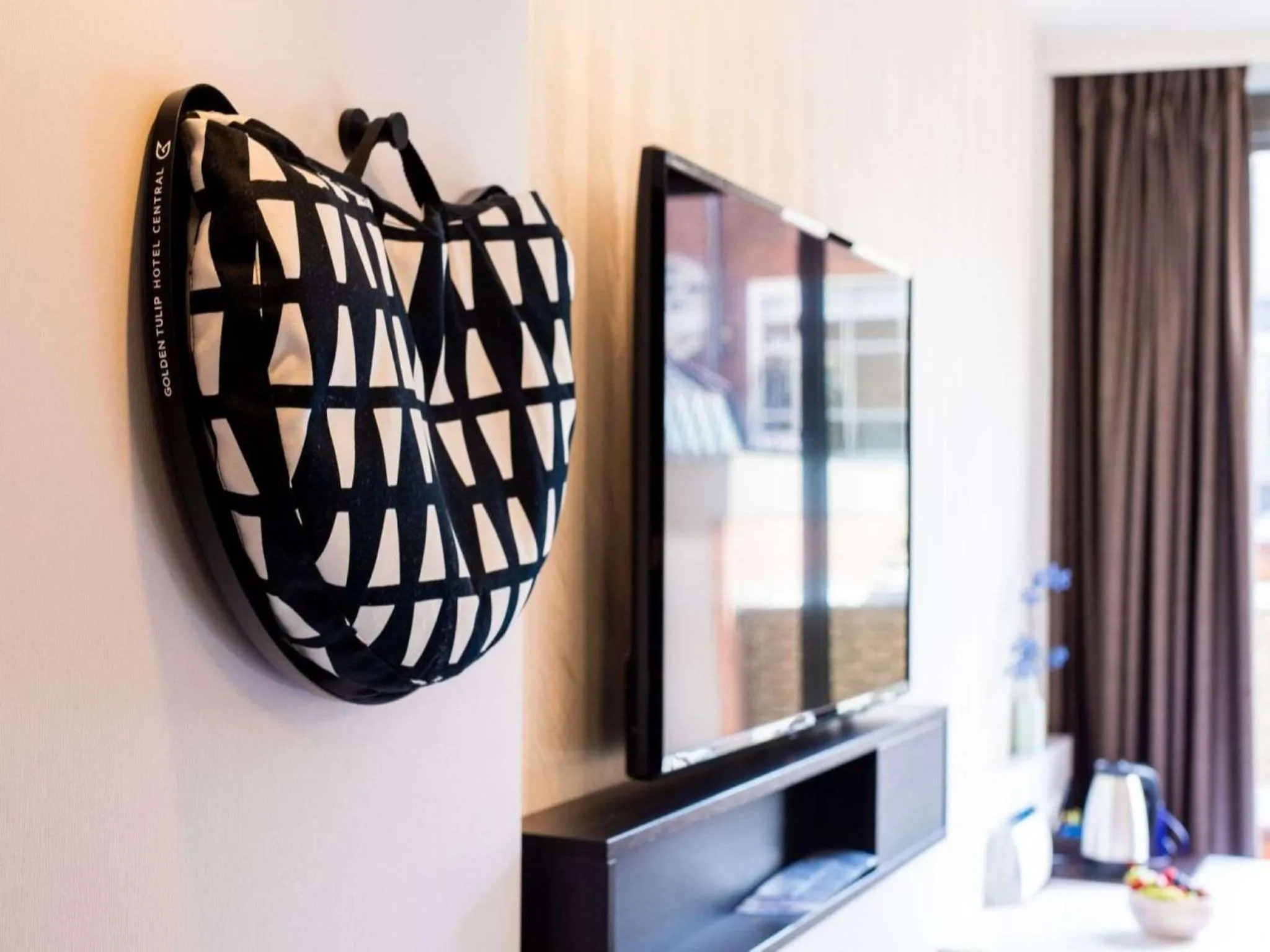 Bedroom in Golden Tulip Hotel Central