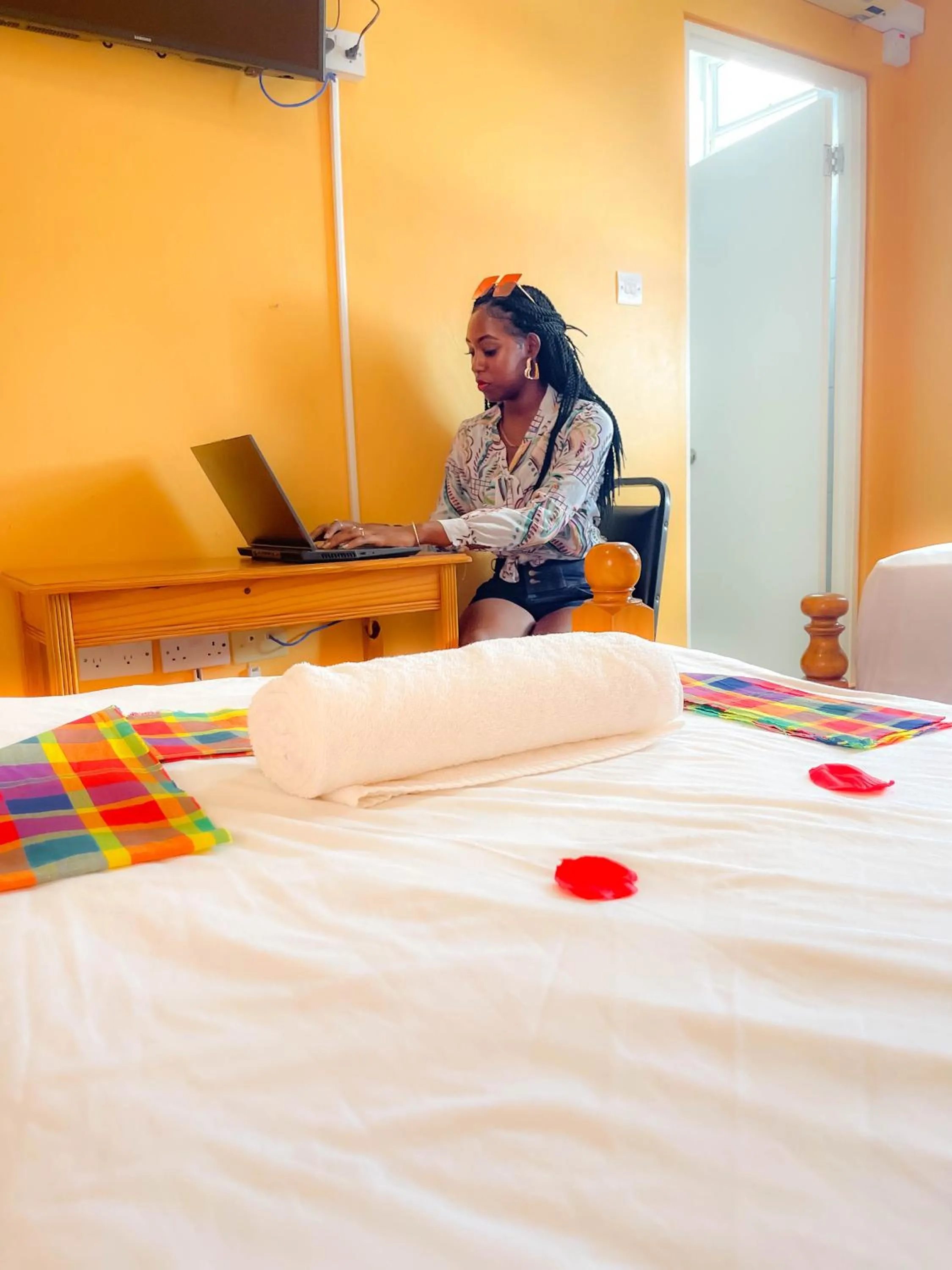 Bedroom in La Flamboyant Hotel