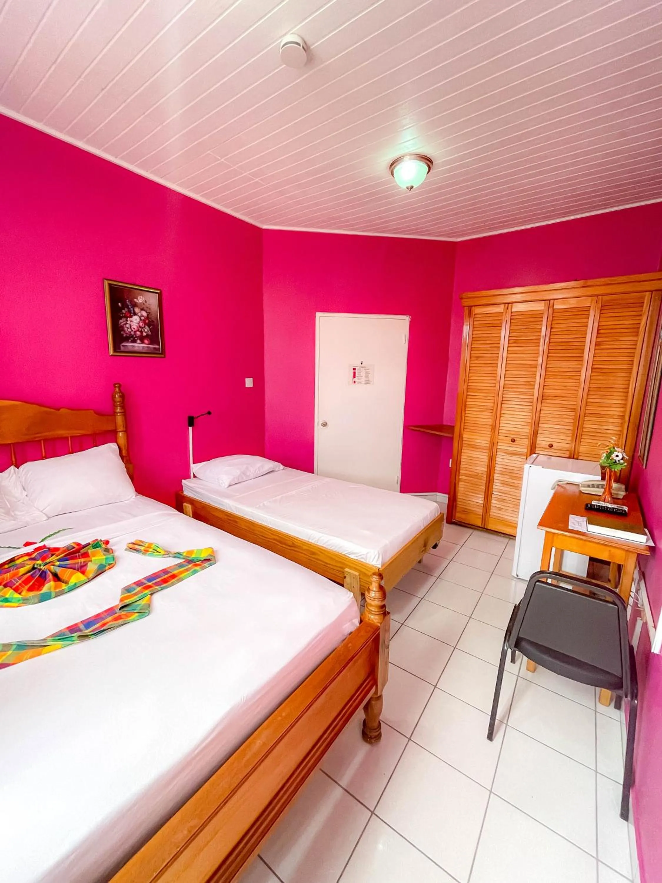 Bedroom, Bed in La Flamboyant Hotel