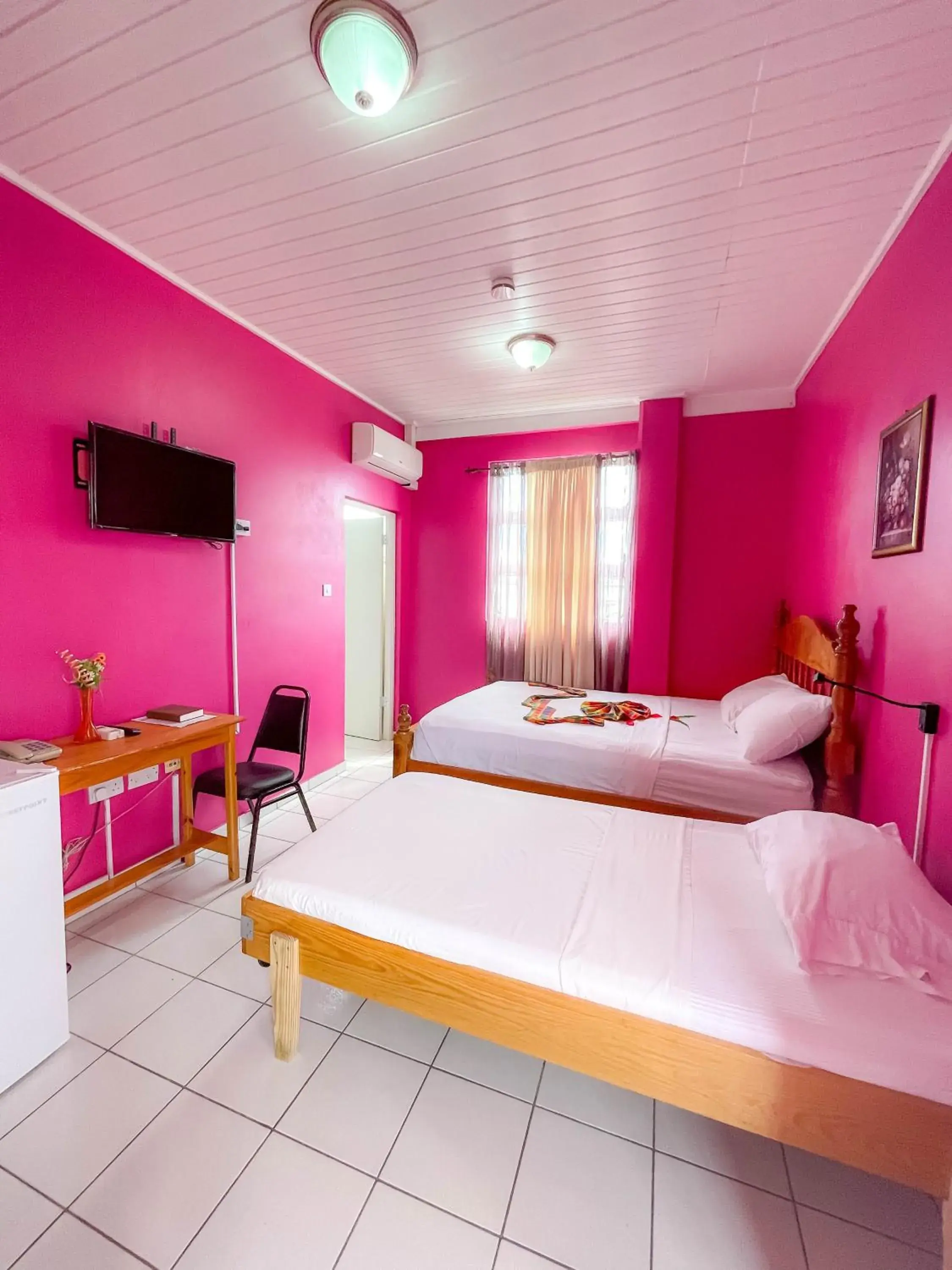 Deluxe Double Room in La Flamboyant Hotel Deluxe Double Room in La Flamboyant Hotel