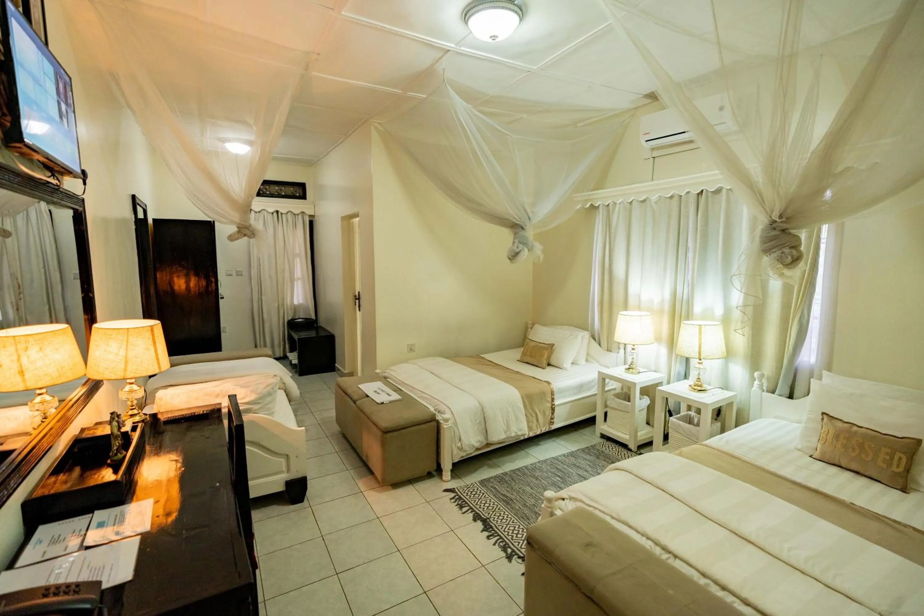 Bed in Blue Veil Villa Hotel