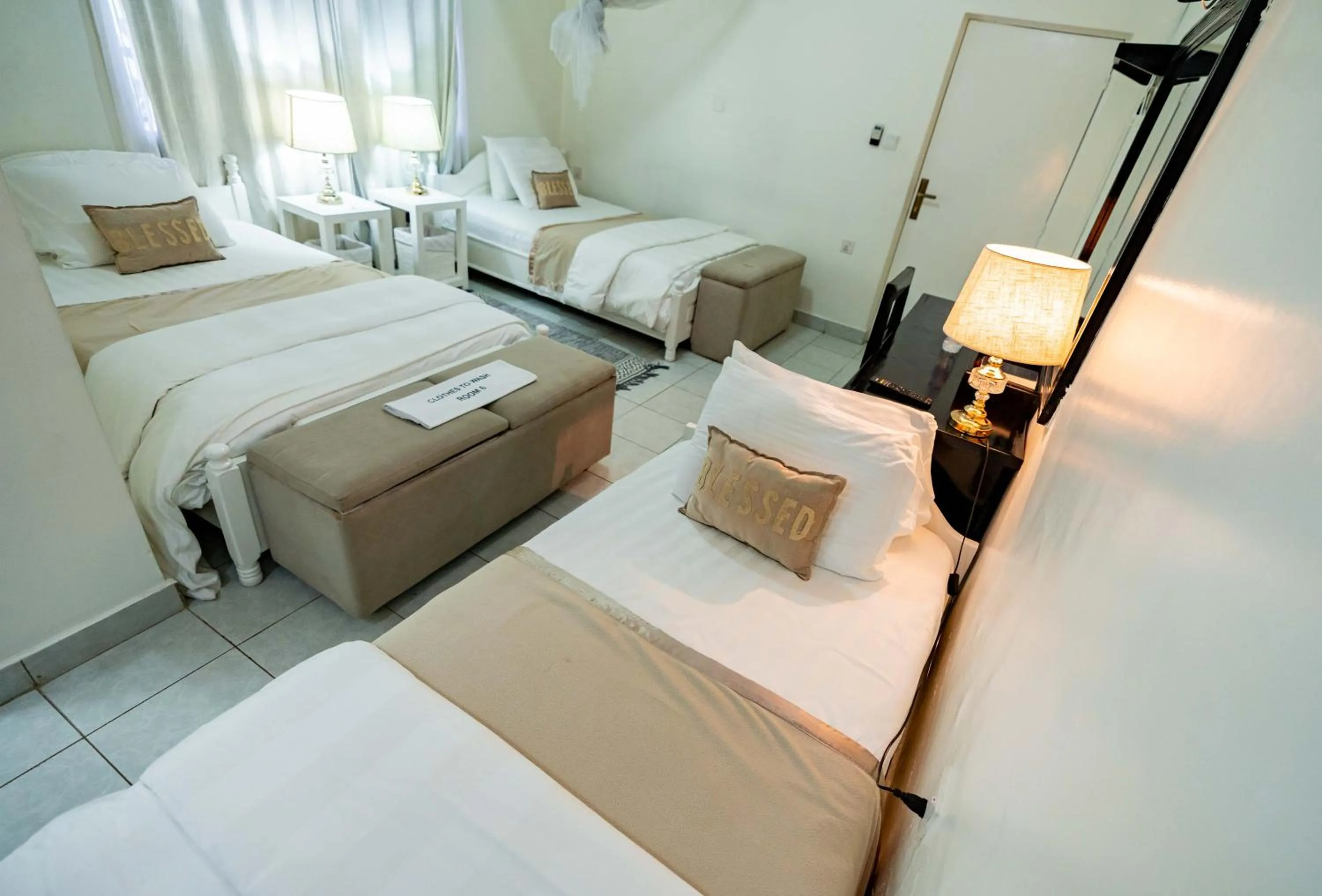 Bed in Blue Veil Villa Hotel