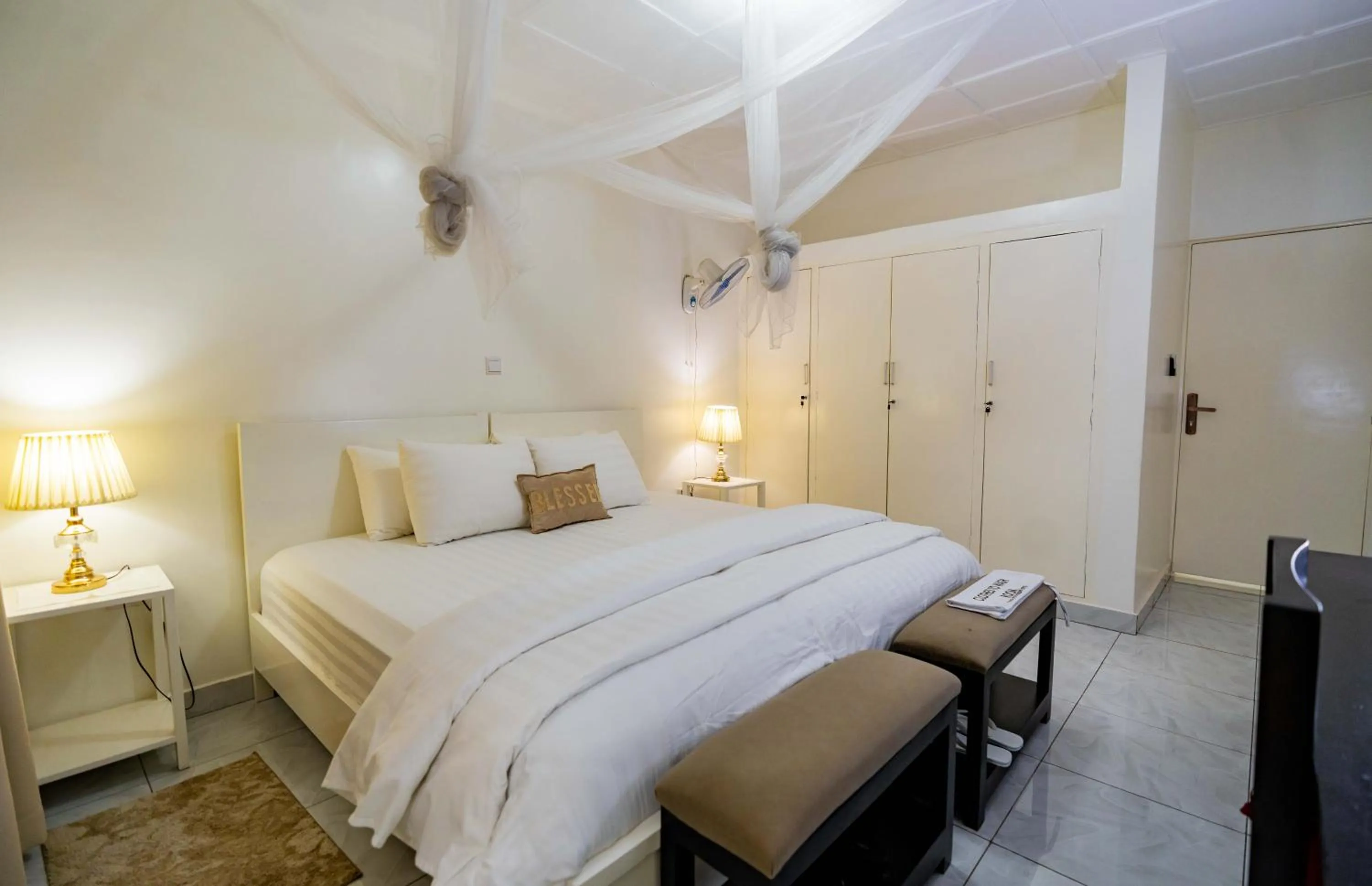 Bed in Blue Veil Villa Hotel