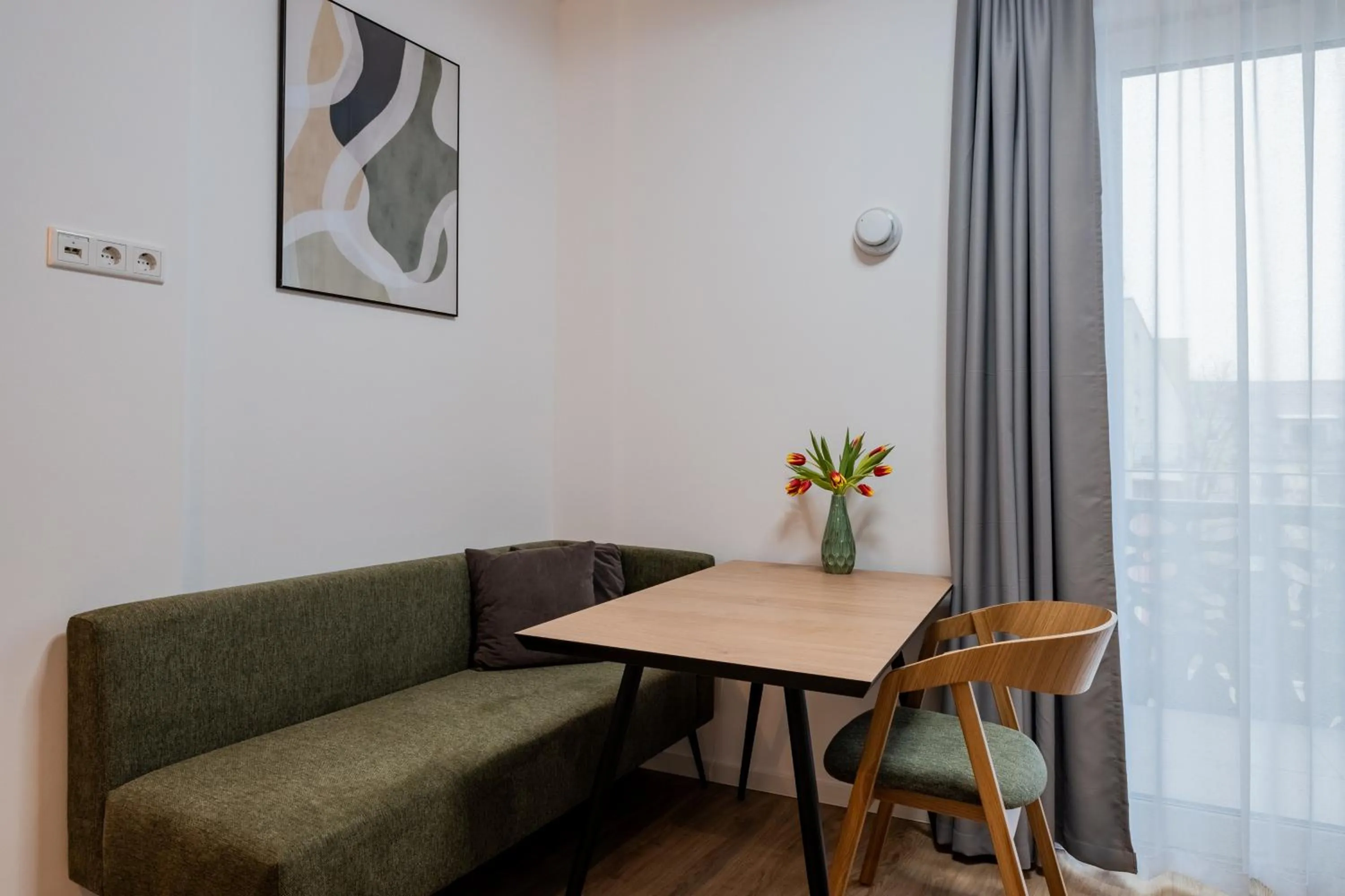 Seating area in Nena Apartments Berlin Adlershof