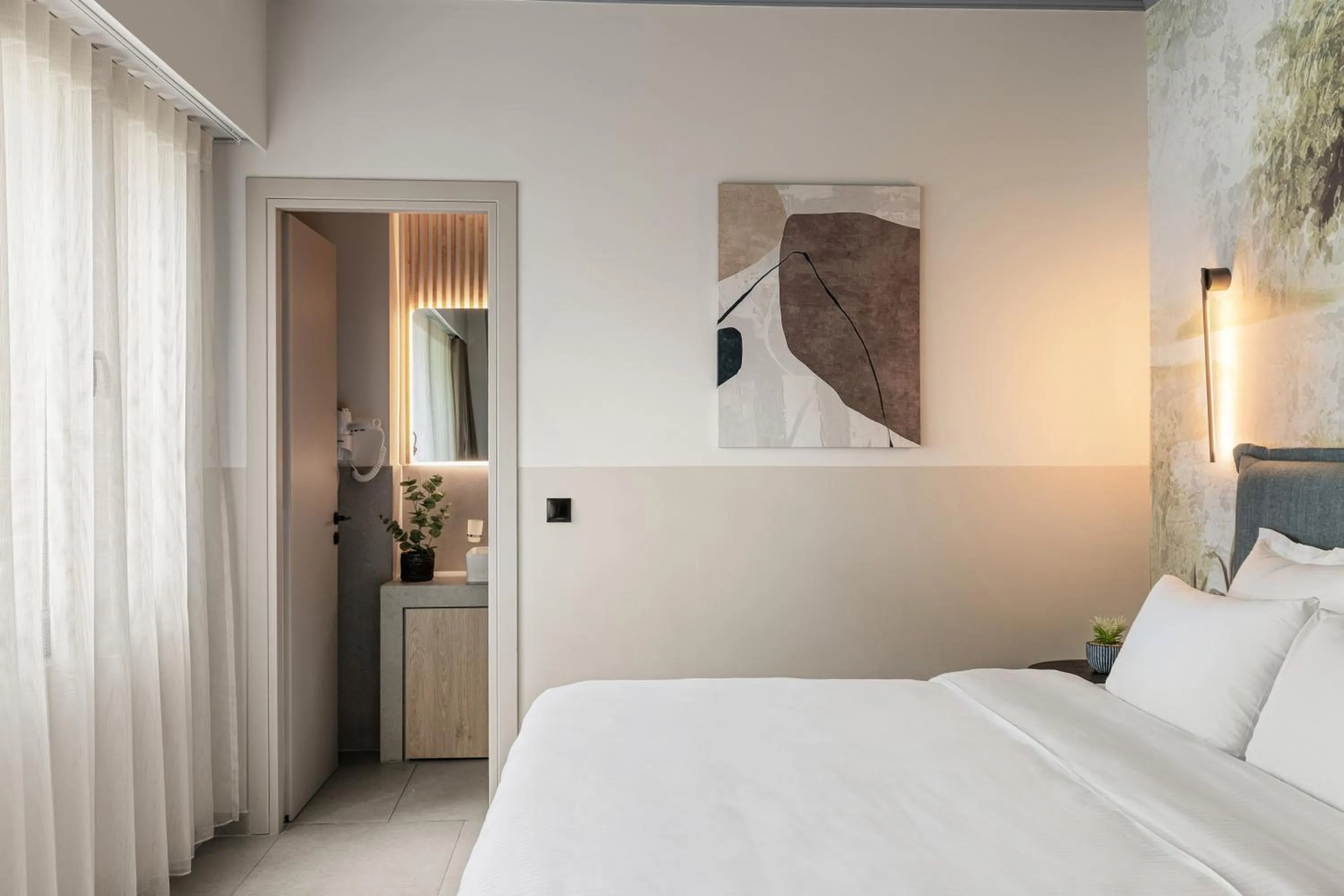 Bed in Airio Athens Suites