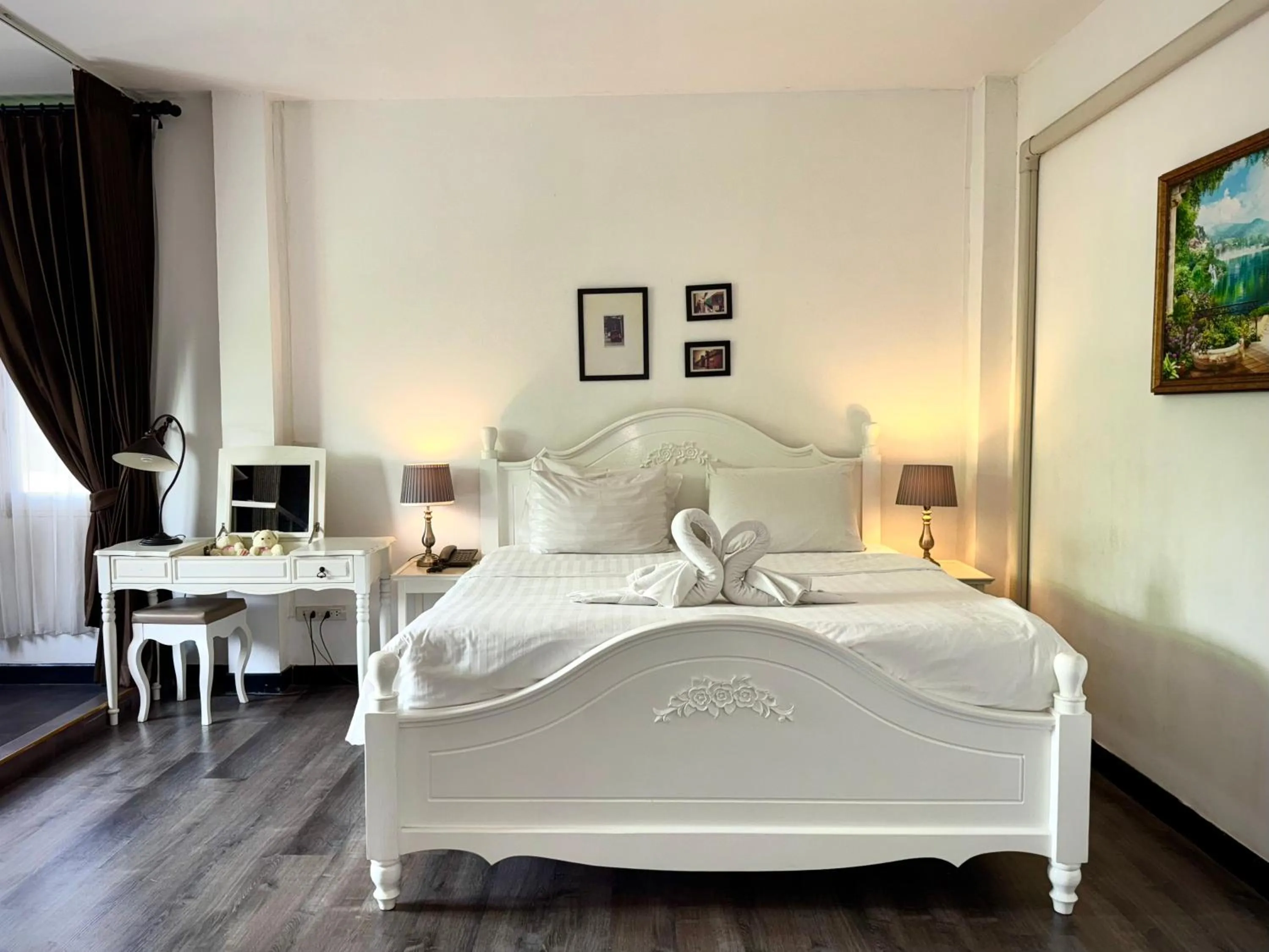 Bed in Nidhra Lanna Hotel Chiang Mai