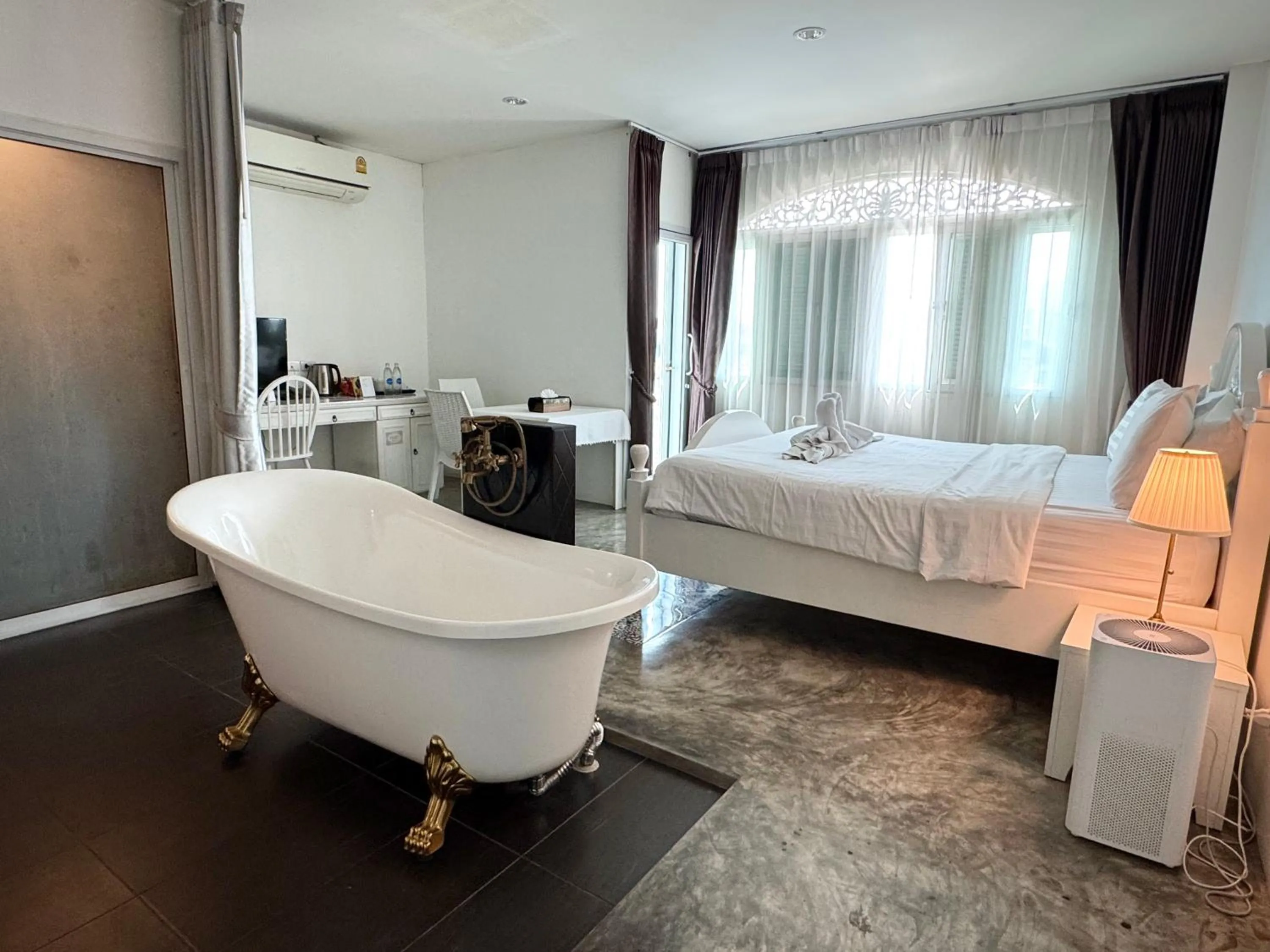 Photo of the whole room, Bed in Nidhra Lanna Hotel Chiang Mai