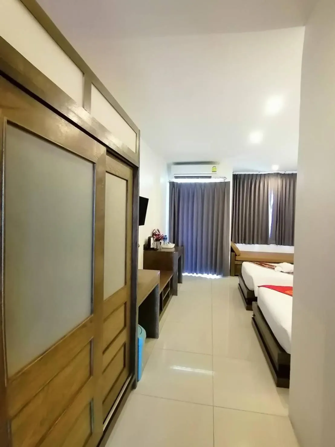 Photo of the whole room, Bed in NJ PATONG HOTEL