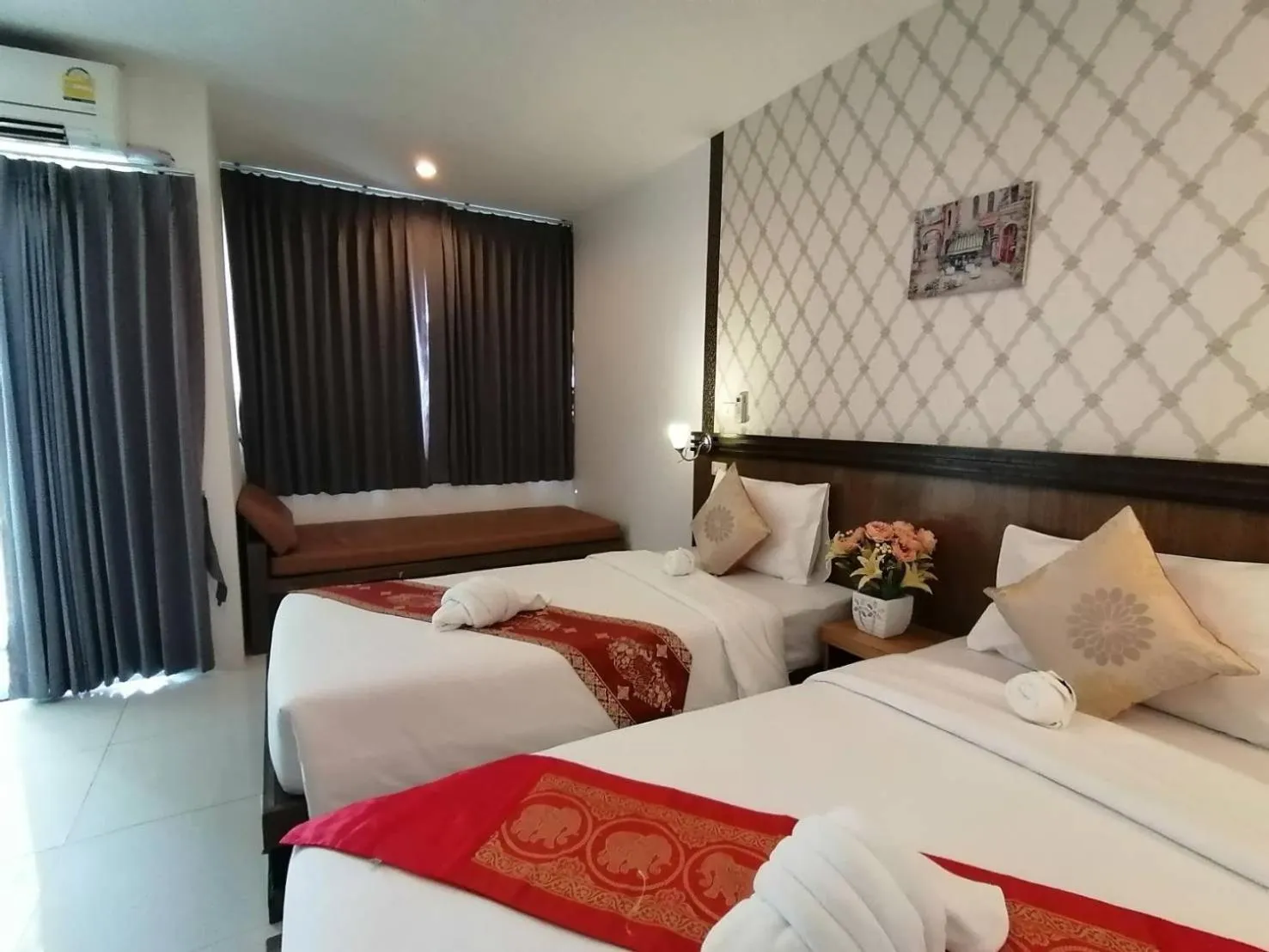 Bed in NJ PATONG HOTEL