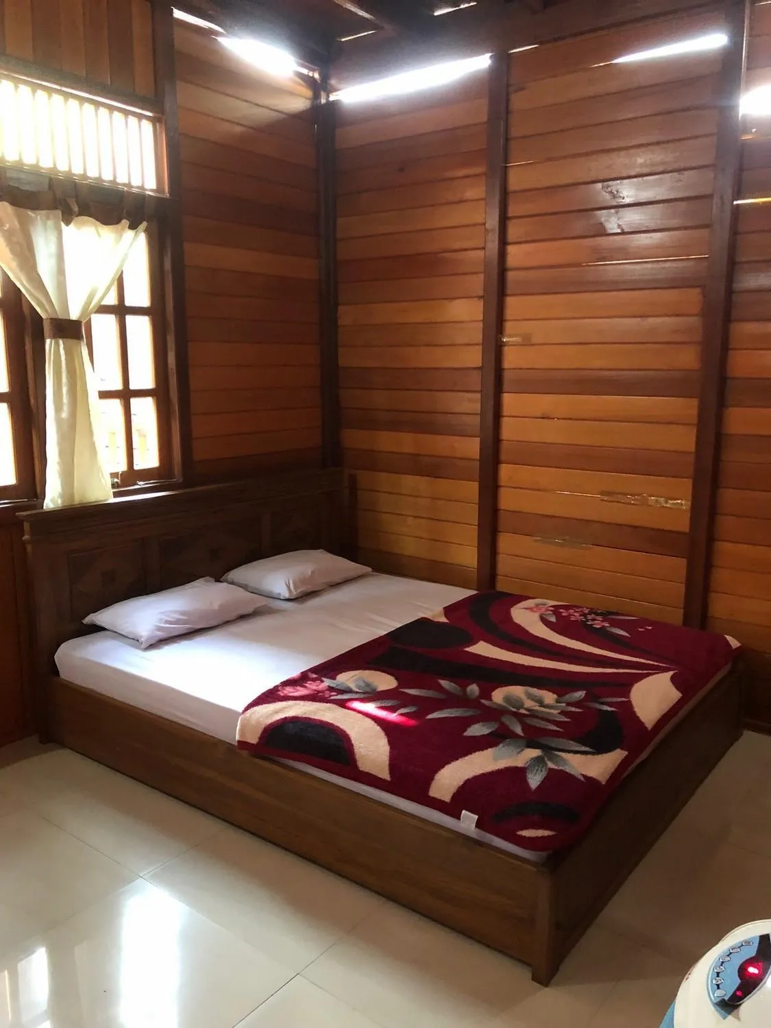 Bed in Roemah Kayu Saragan Syariah Magelang Mitra RedDoorz