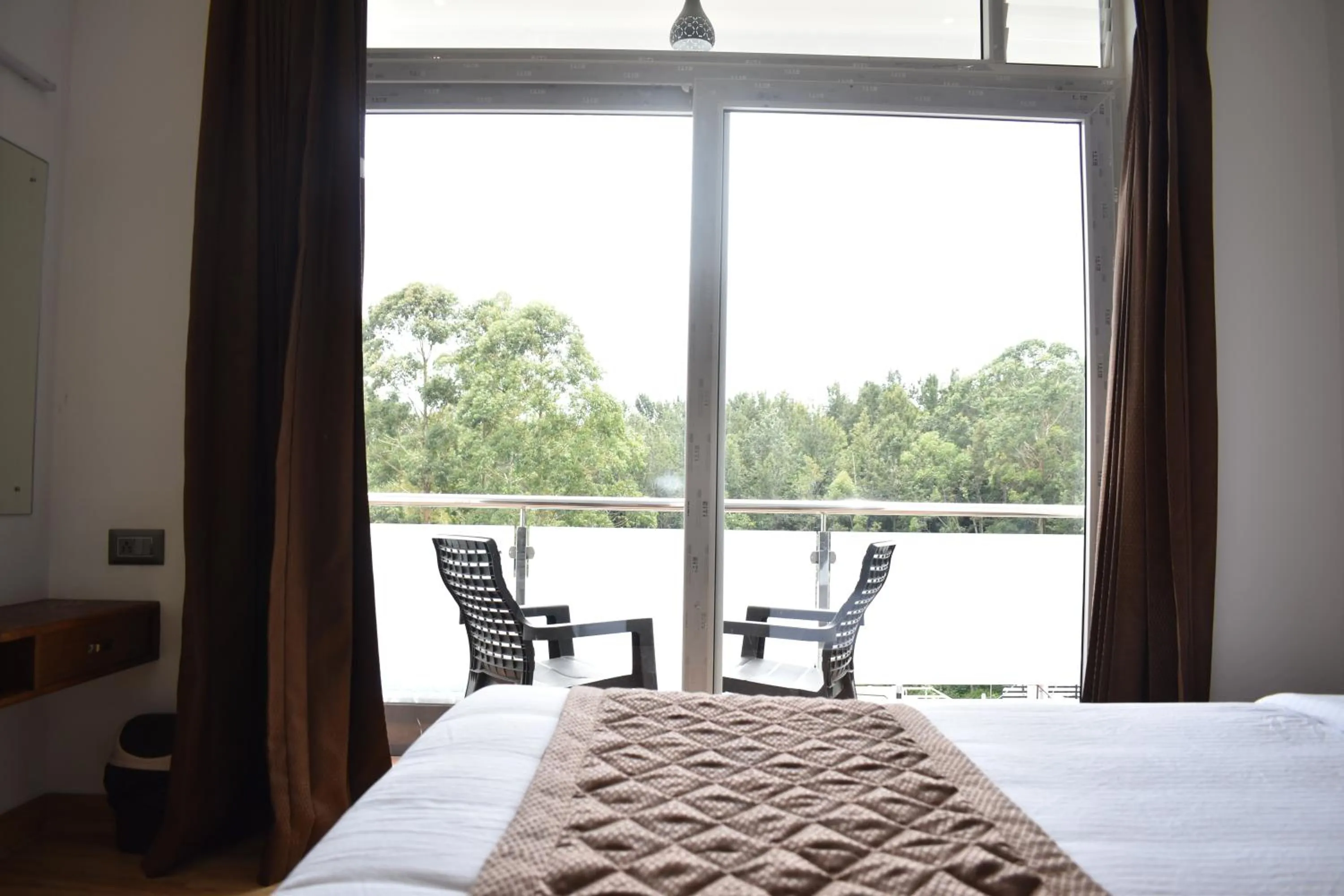Bed in Hotel NT Grand Yercaud