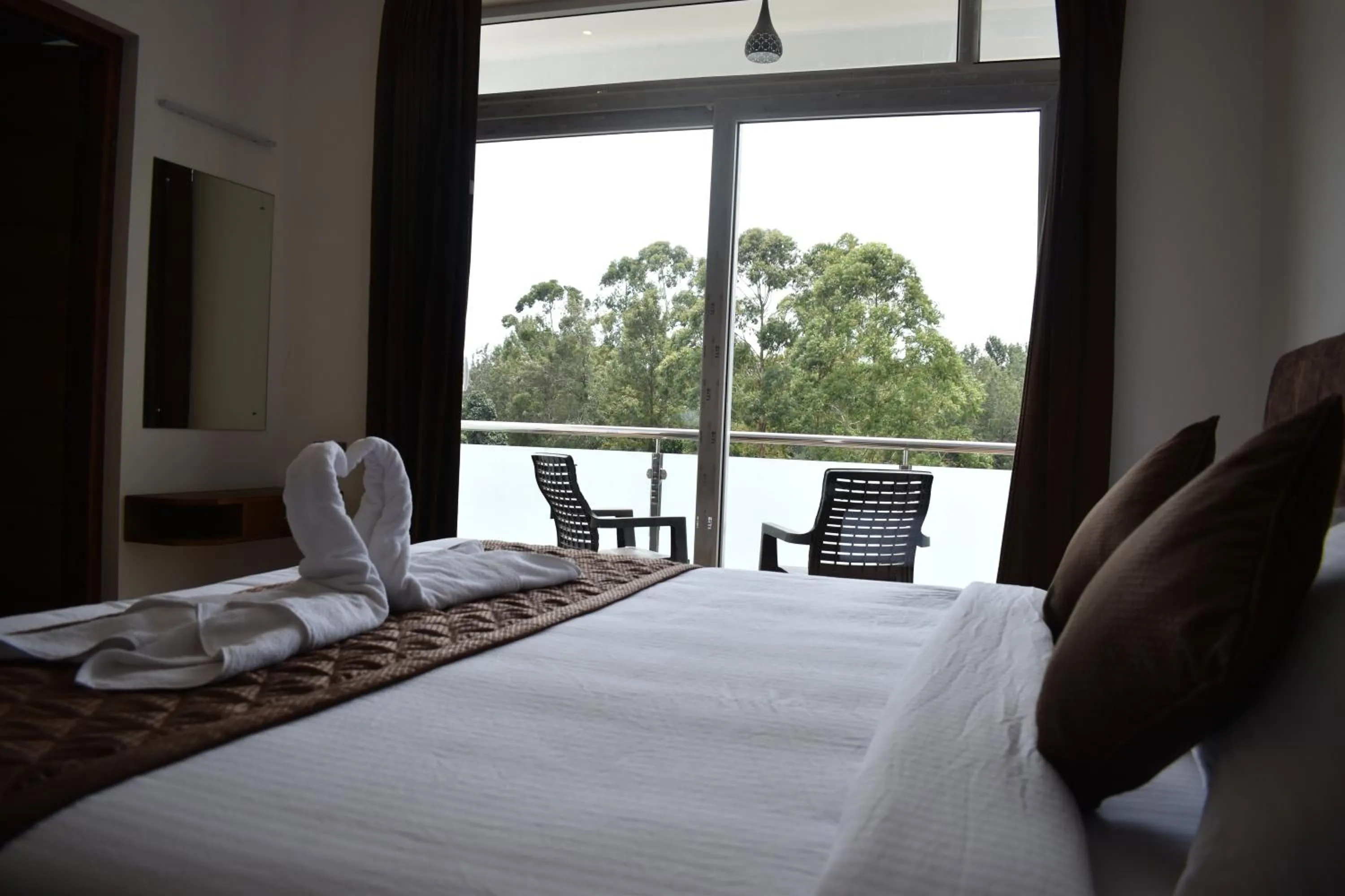 Bedroom, Bed in Hotel NT Grand Yercaud