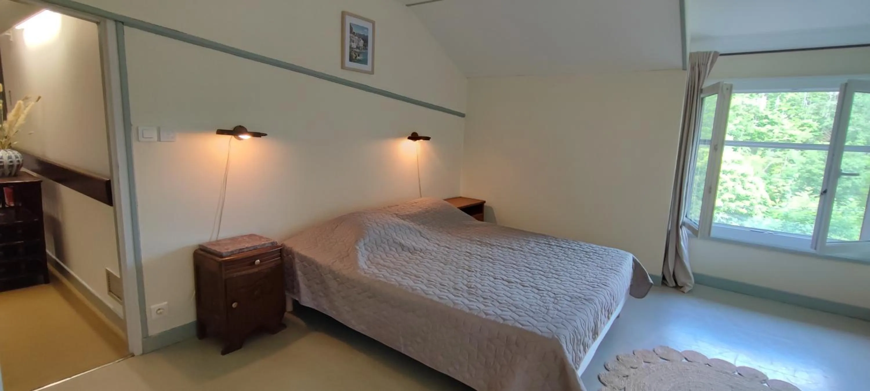 Bed in Les chambres d'hôtes de La Bastide du puech