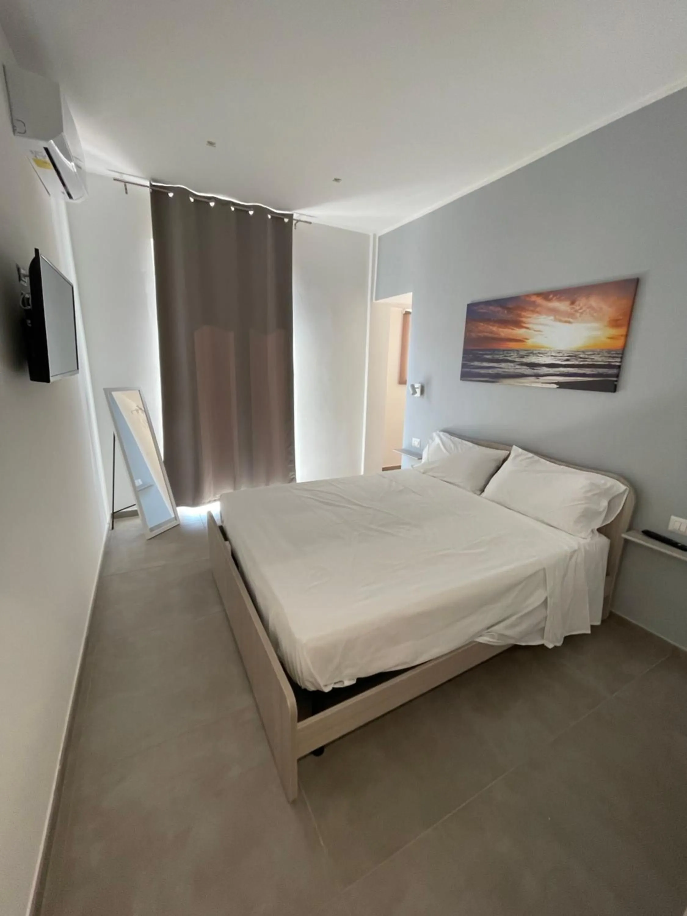 Bed in M&M rooms Margherita di Savoia