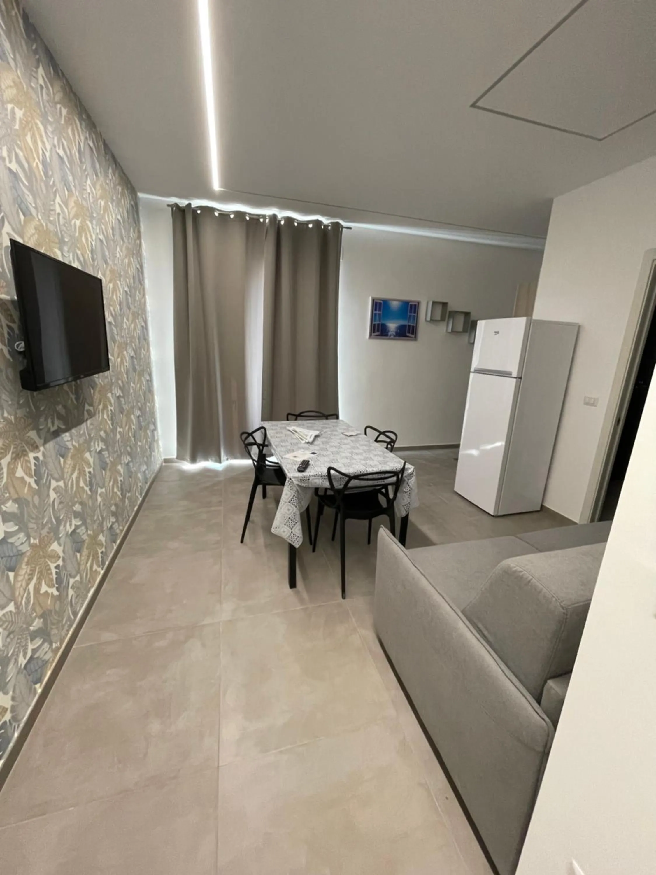 TV/Entertainment Center in M&M rooms Margherita di Savoia