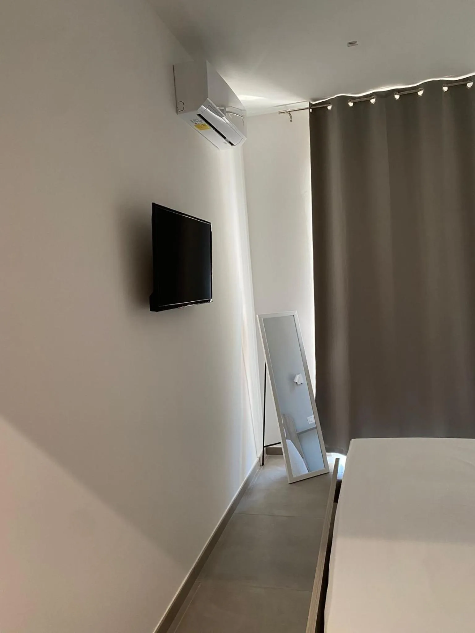 Bed in M&M rooms Margherita di Savoia