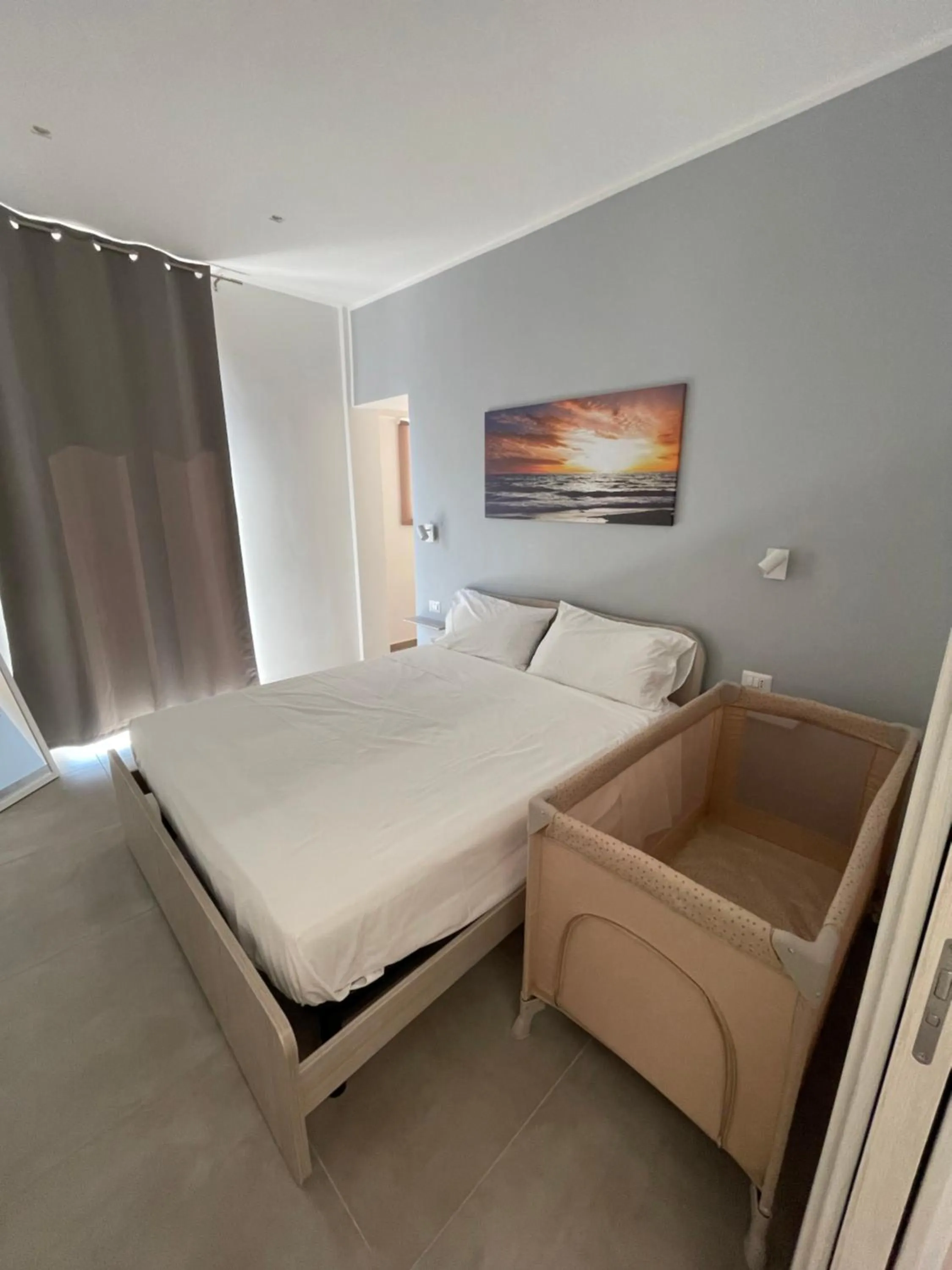 Bed in M&M rooms Margherita di Savoia